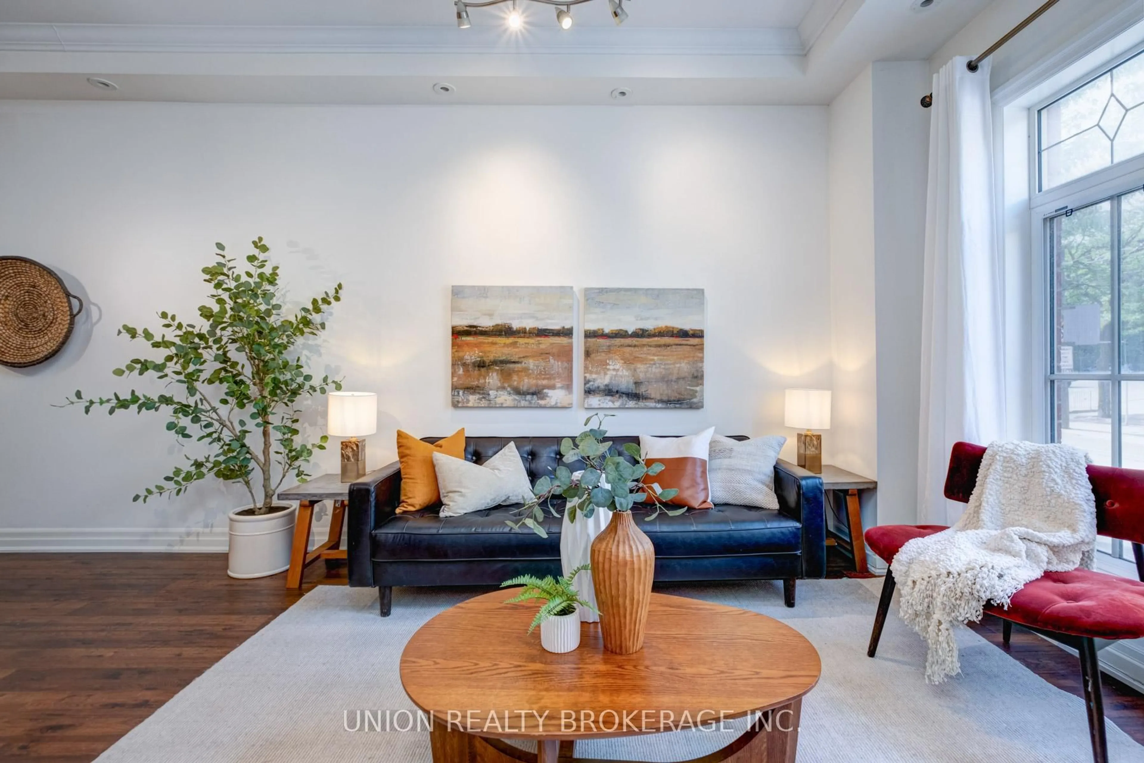 Living room with furniture, wood/laminate floor for 443C Queen St, Toronto Ontario M1C 2W7