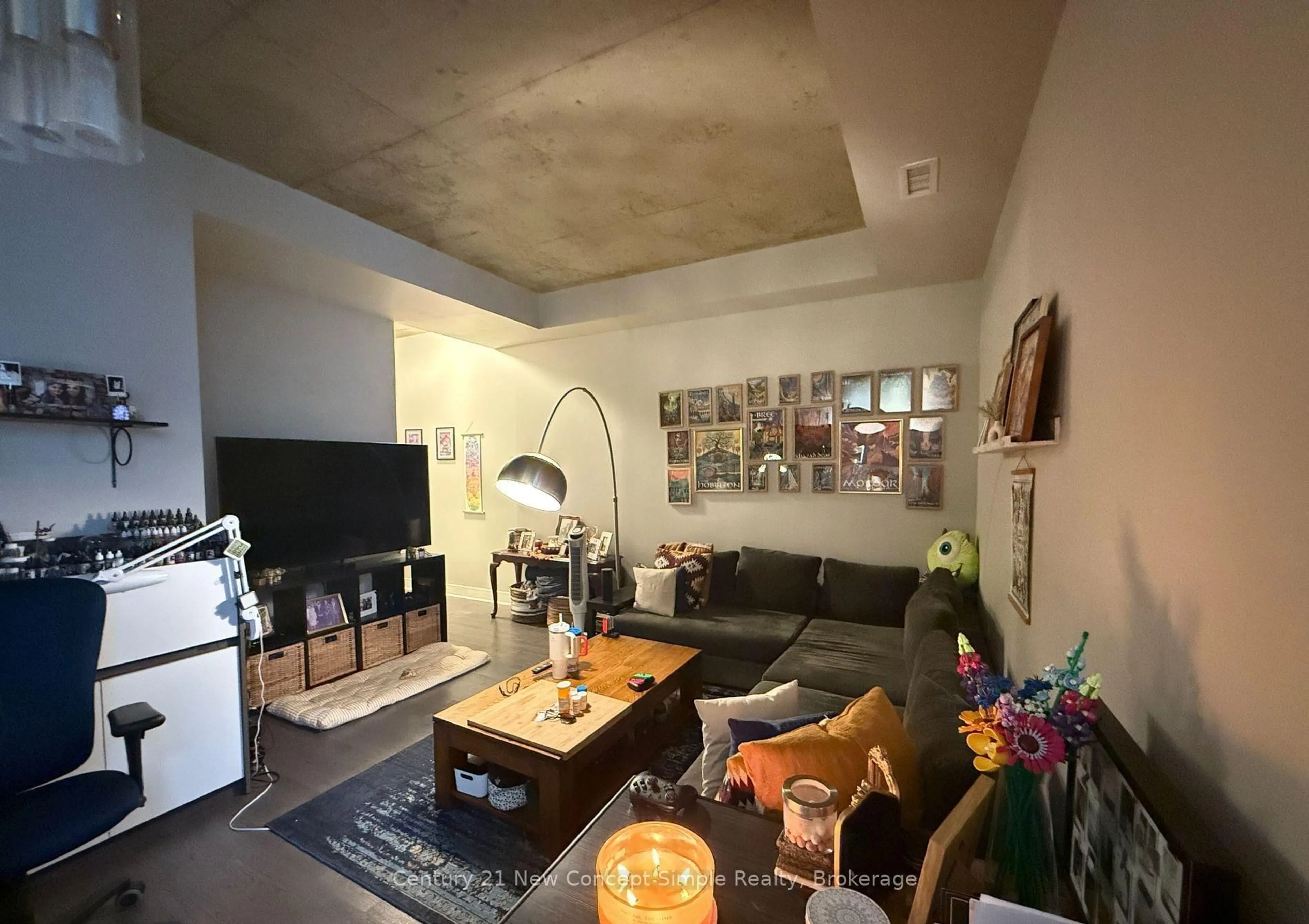 Living room with furniture, cement floor for 399 Adelaide St #305, Toronto Ontario M5V 1S4