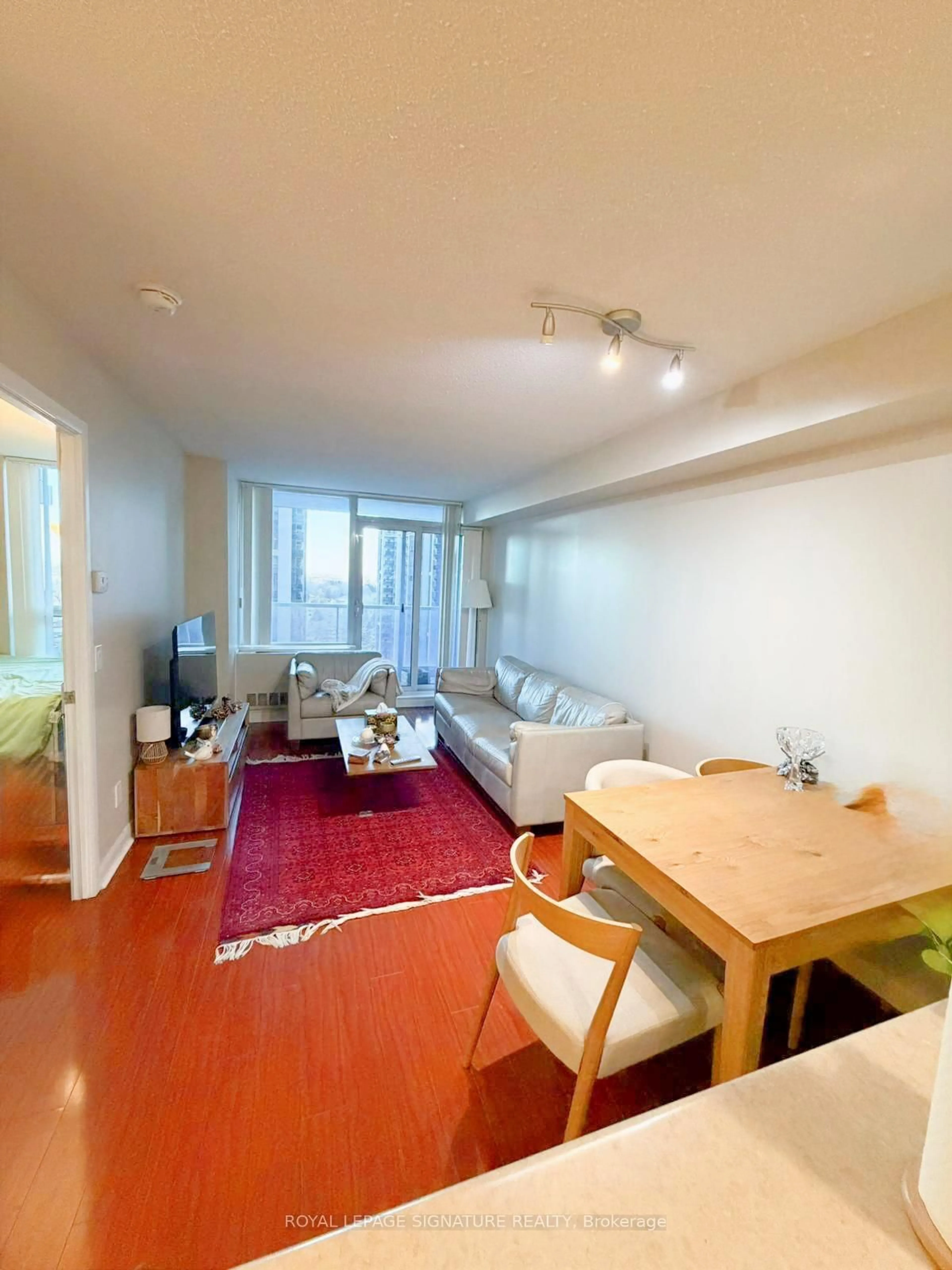 Living room with furniture, unknown for 4968 Yonge St #1702, Toronto Ontario M2N 7G9