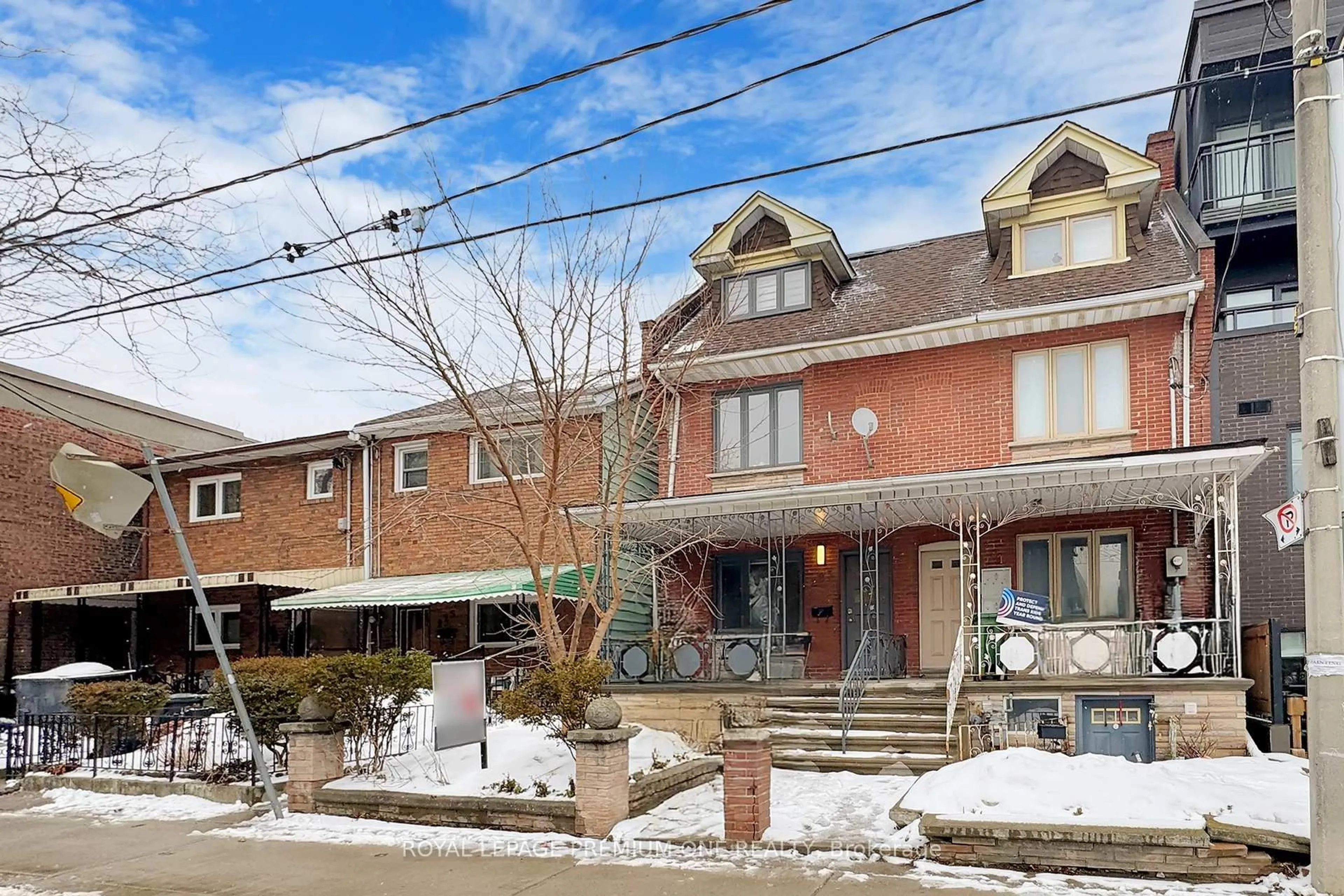 Home with brick exterior material, street for 223 Manning Ave, Toronto Ontario M6J 2K8