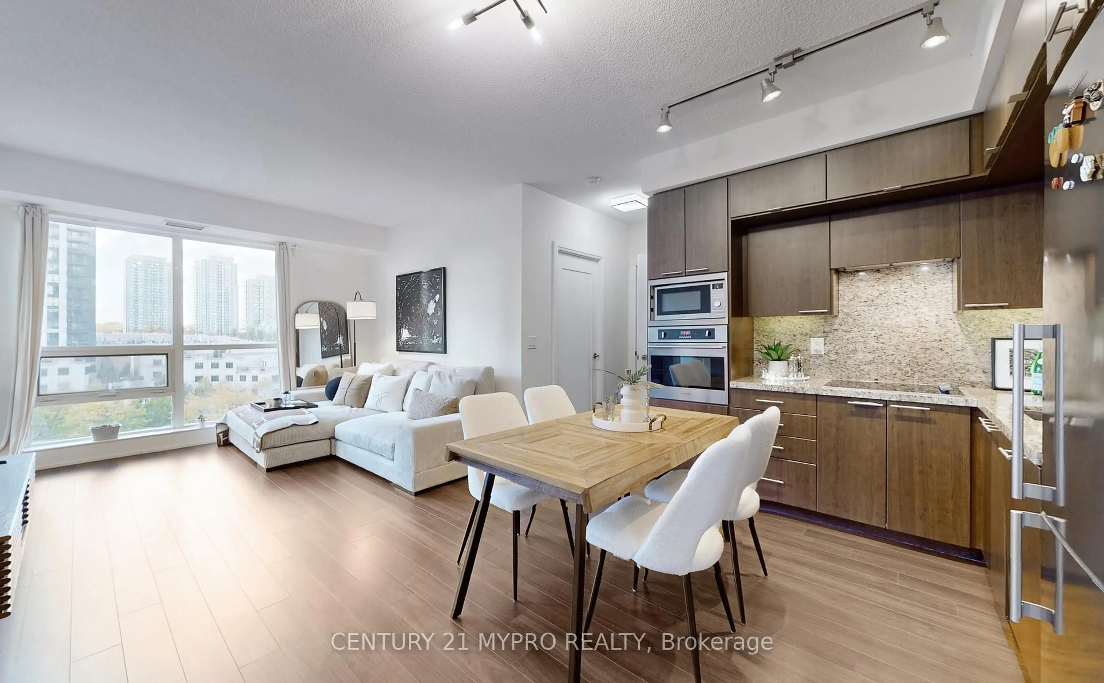 Open concept kitchen, wood/laminate floor for 120 Harrison Garden Blvd #633, Toronto Ontario M2N 0H1