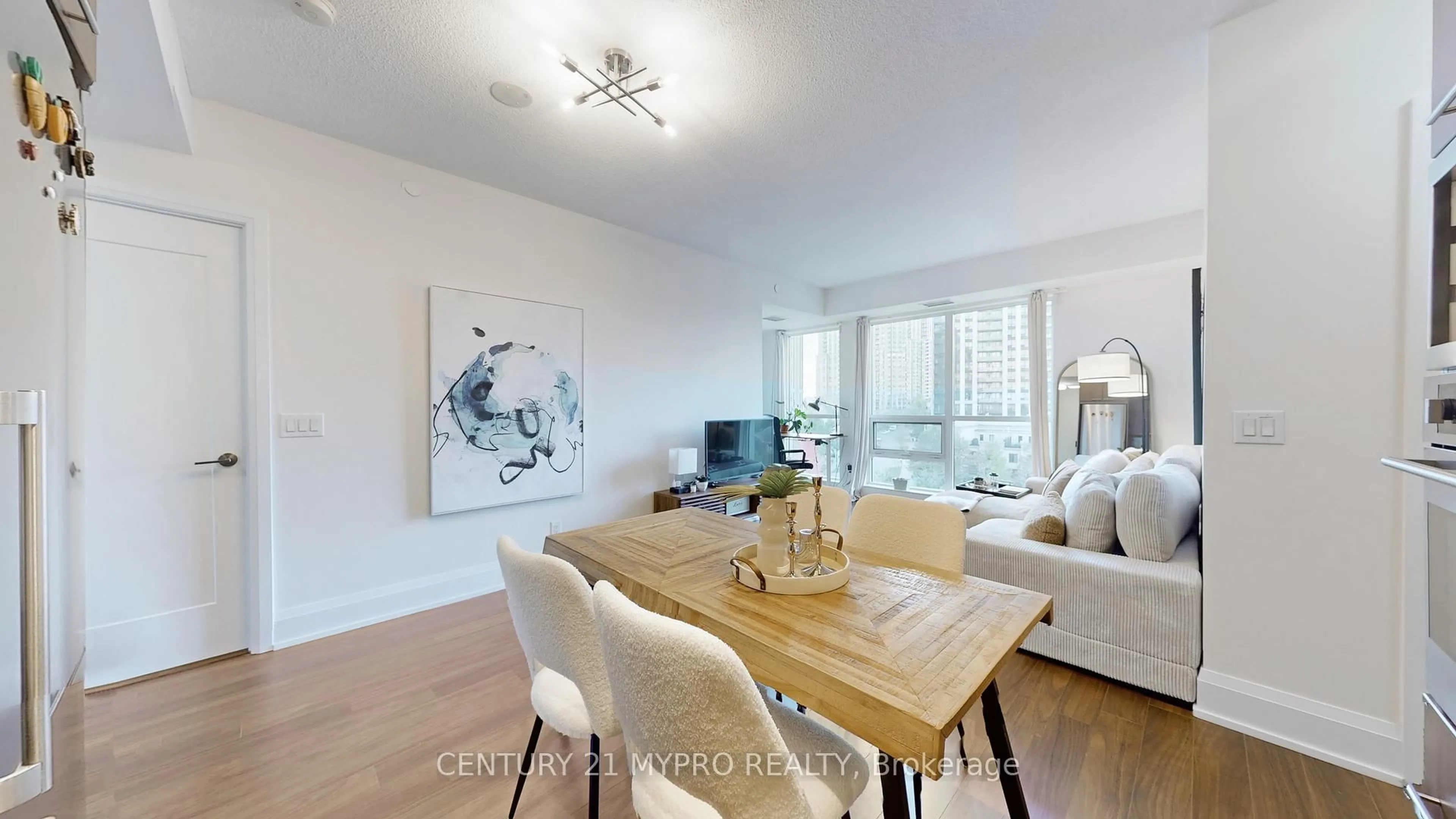 Living room with furniture, wood/laminate floor for 120 Harrison Garden Blvd #633, Toronto Ontario M2N 0H1