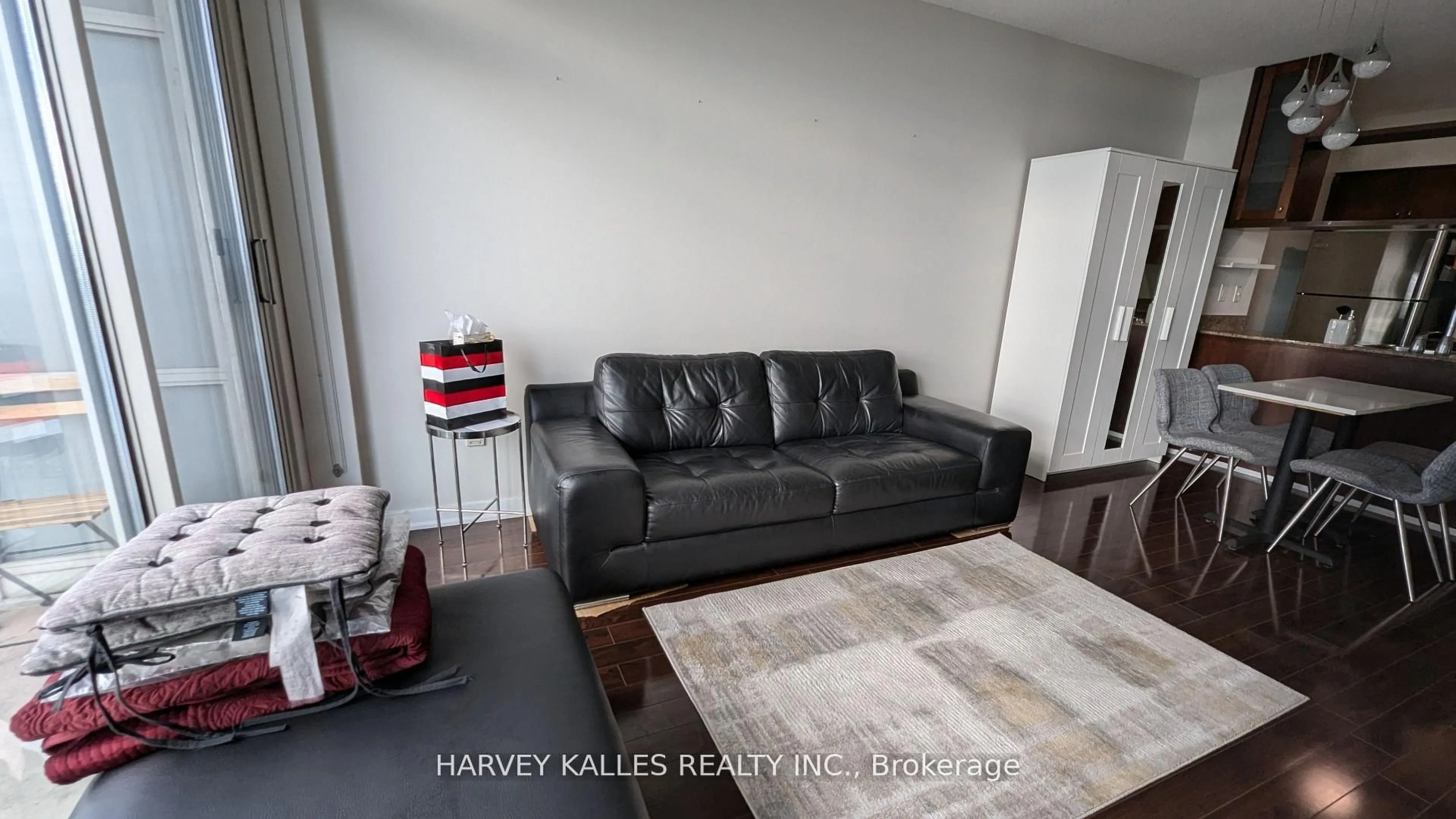 Living room with furniture, wood/laminate floor for 35 Mariner Terr #4001, Toronto Ontario M5V 3V9