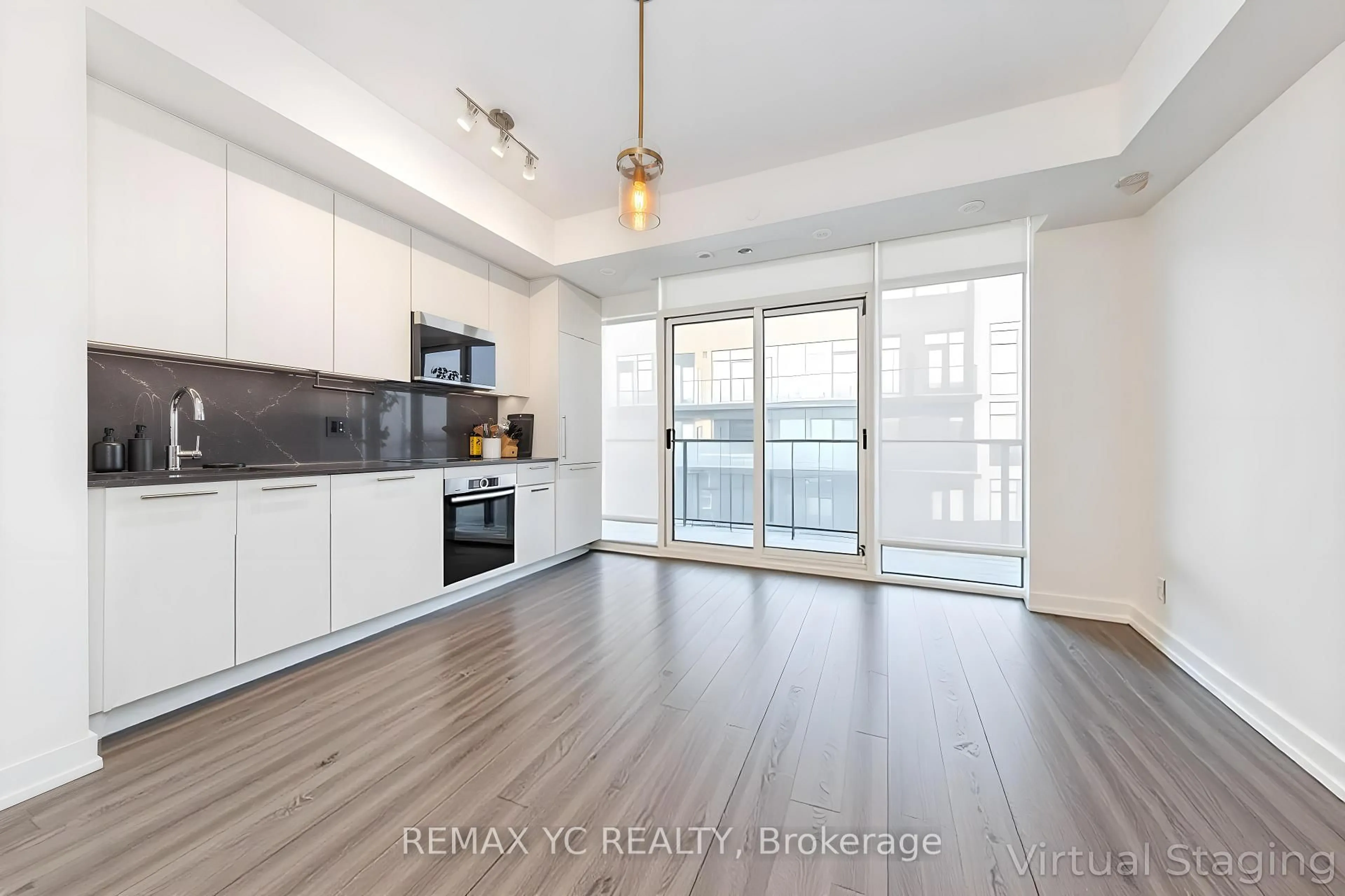Open concept kitchen, wood/laminate floor for 871 Sheppard Ave #44, Toronto Ontario M3H 0E8