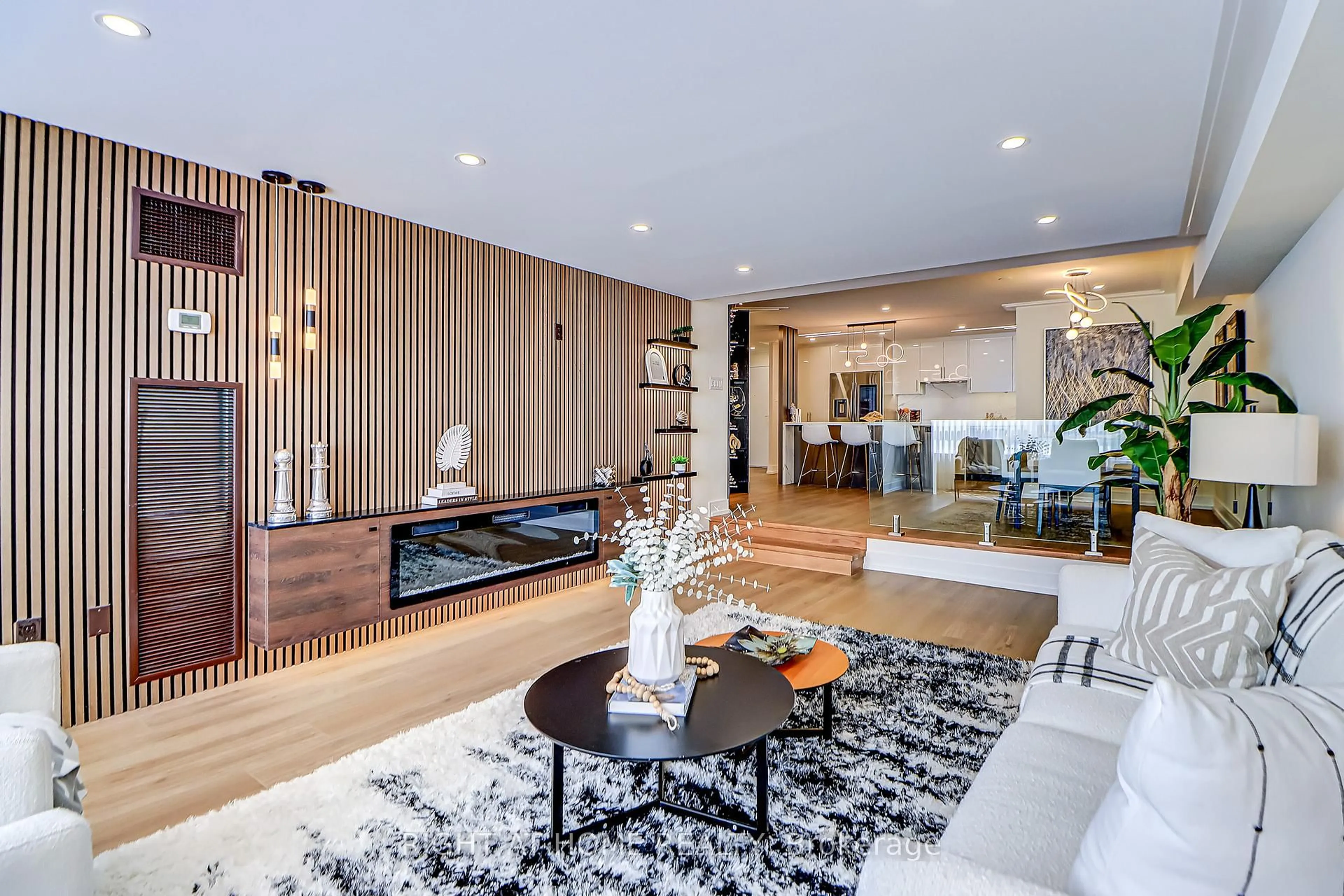 Living room with furniture, wood/laminate floor for 130 Carlton St #1207, Toronto Ontario M5A 4K3