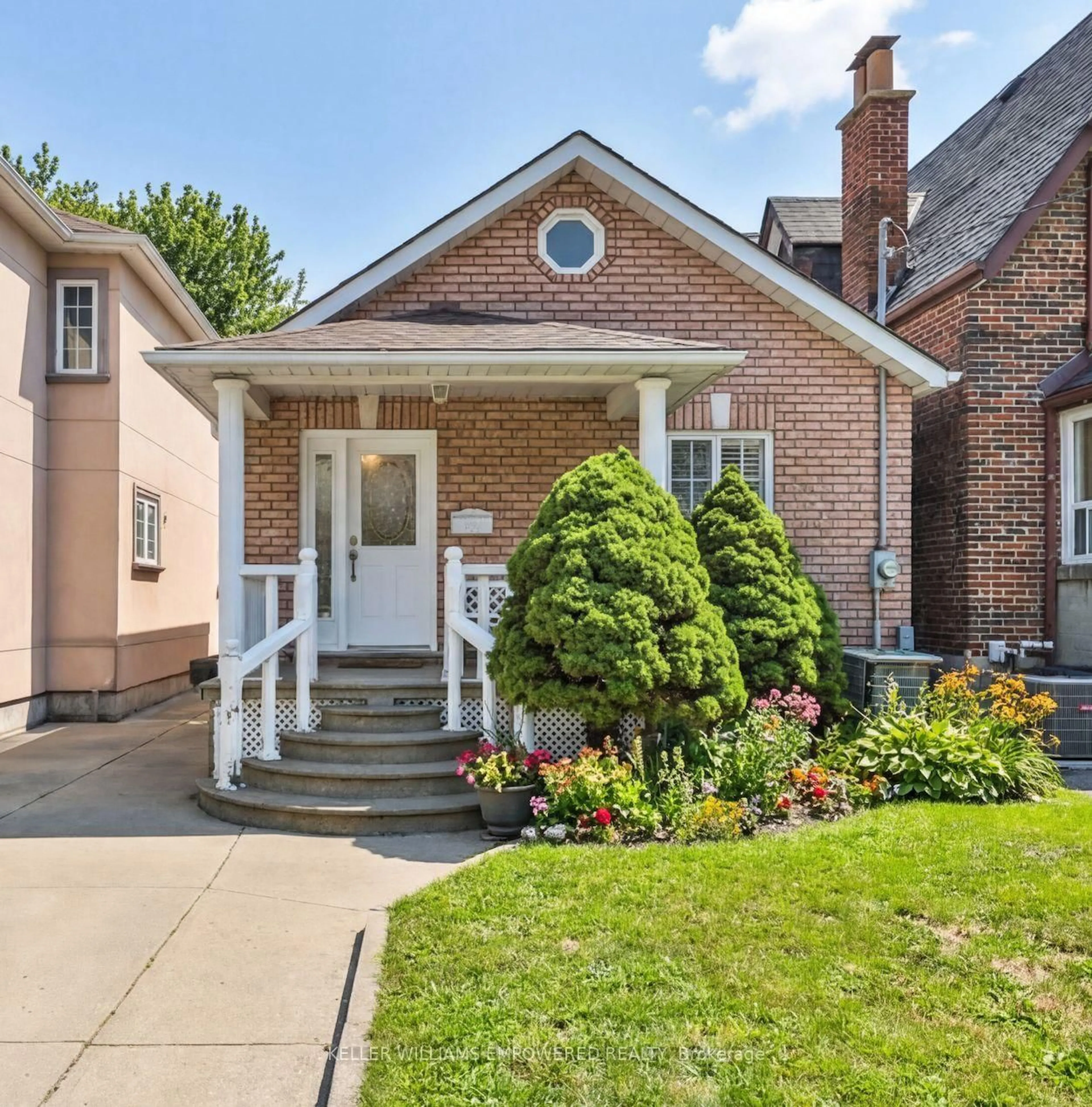 Home with brick exterior material, street for 103 Clovelly Ave, Toronto Ontario M6E 2E7