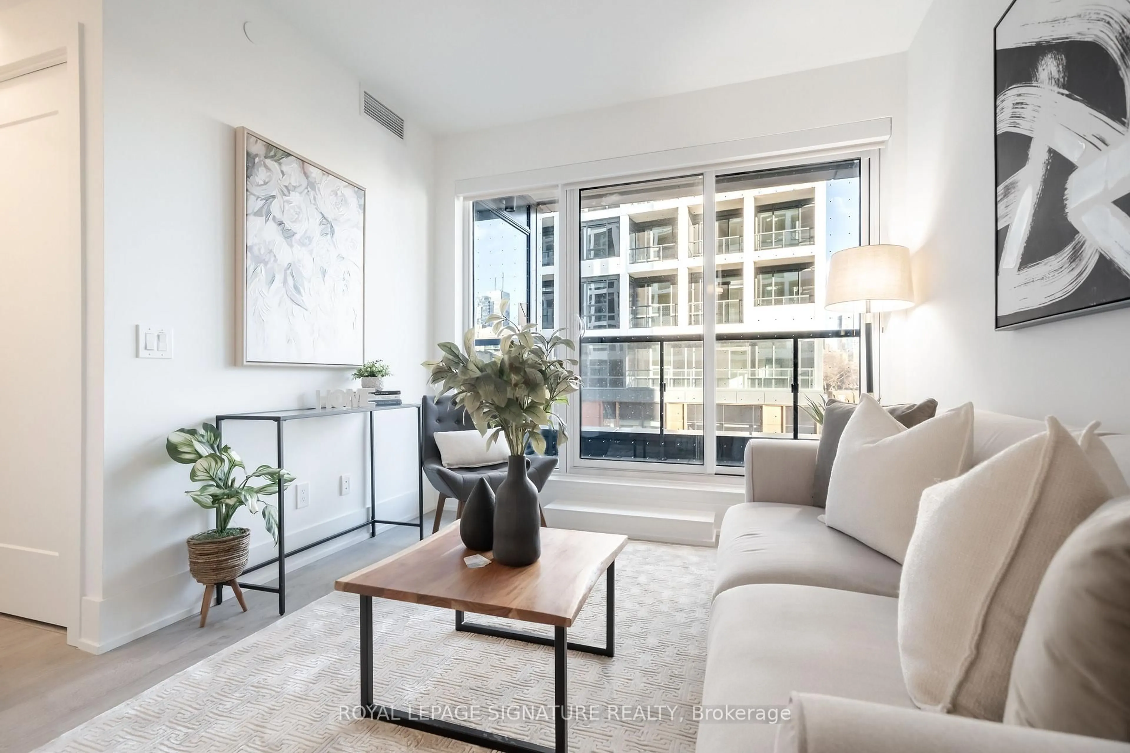 Living room with furniture, unknown for 115 Denison Ave #303, Toronto Ontario M5T 2N1