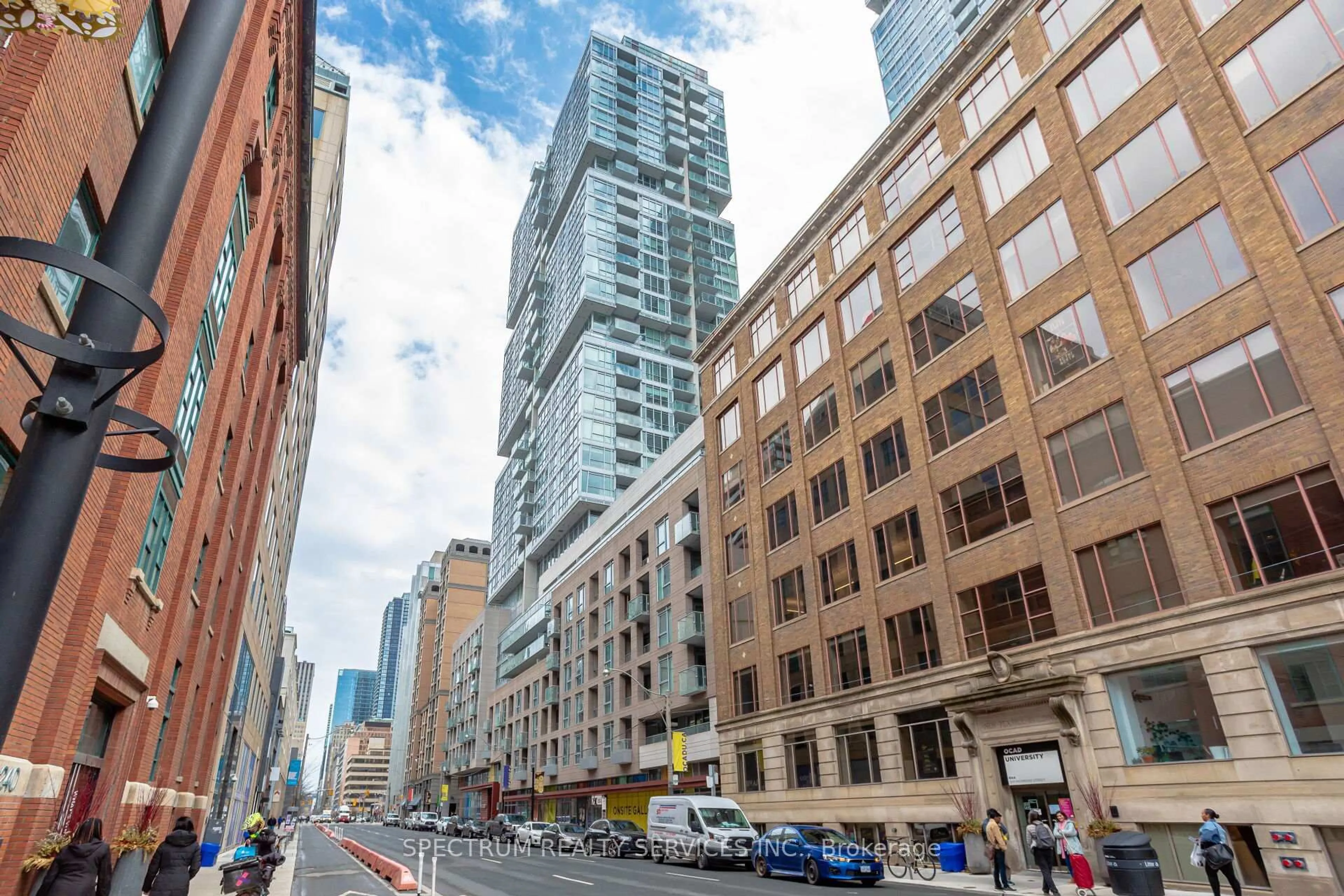 Patio, city buildings view from balcony for 199 Richmond St #417, Toronto Ontario M5V 0H4