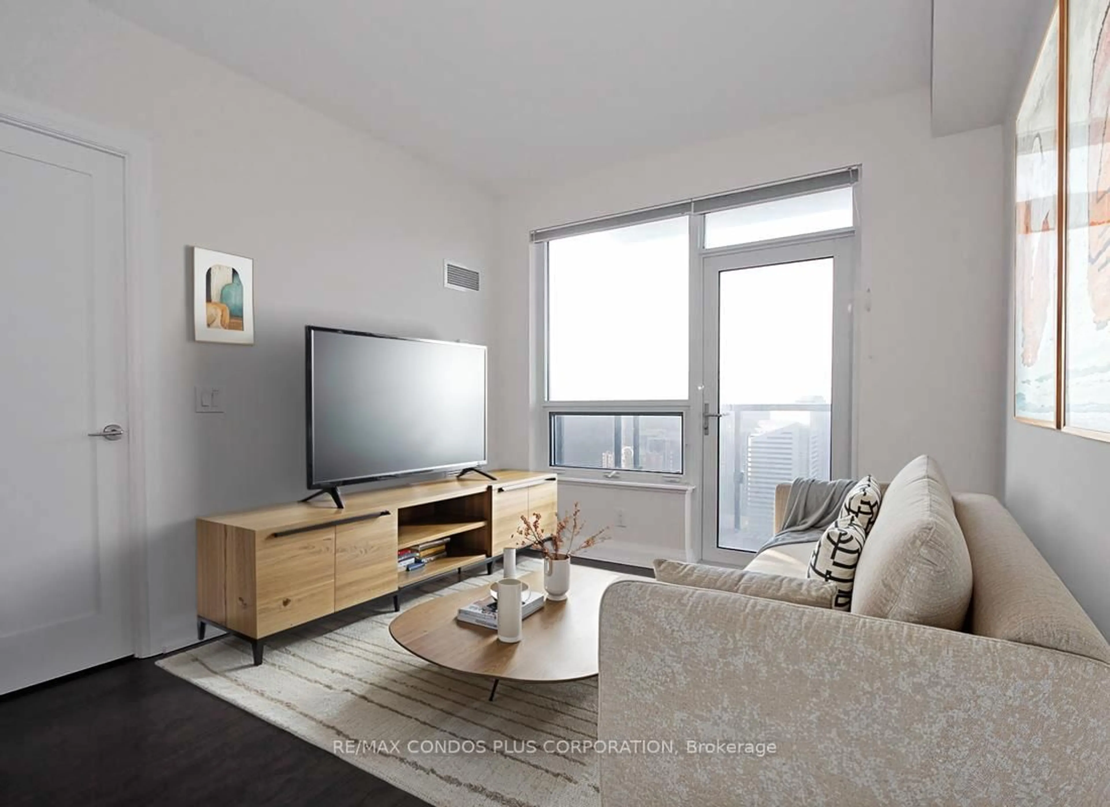 Living room with furniture, wood/laminate floor for 5 Sheppard Ave #3721, Toronto Ontario M2N 0G4