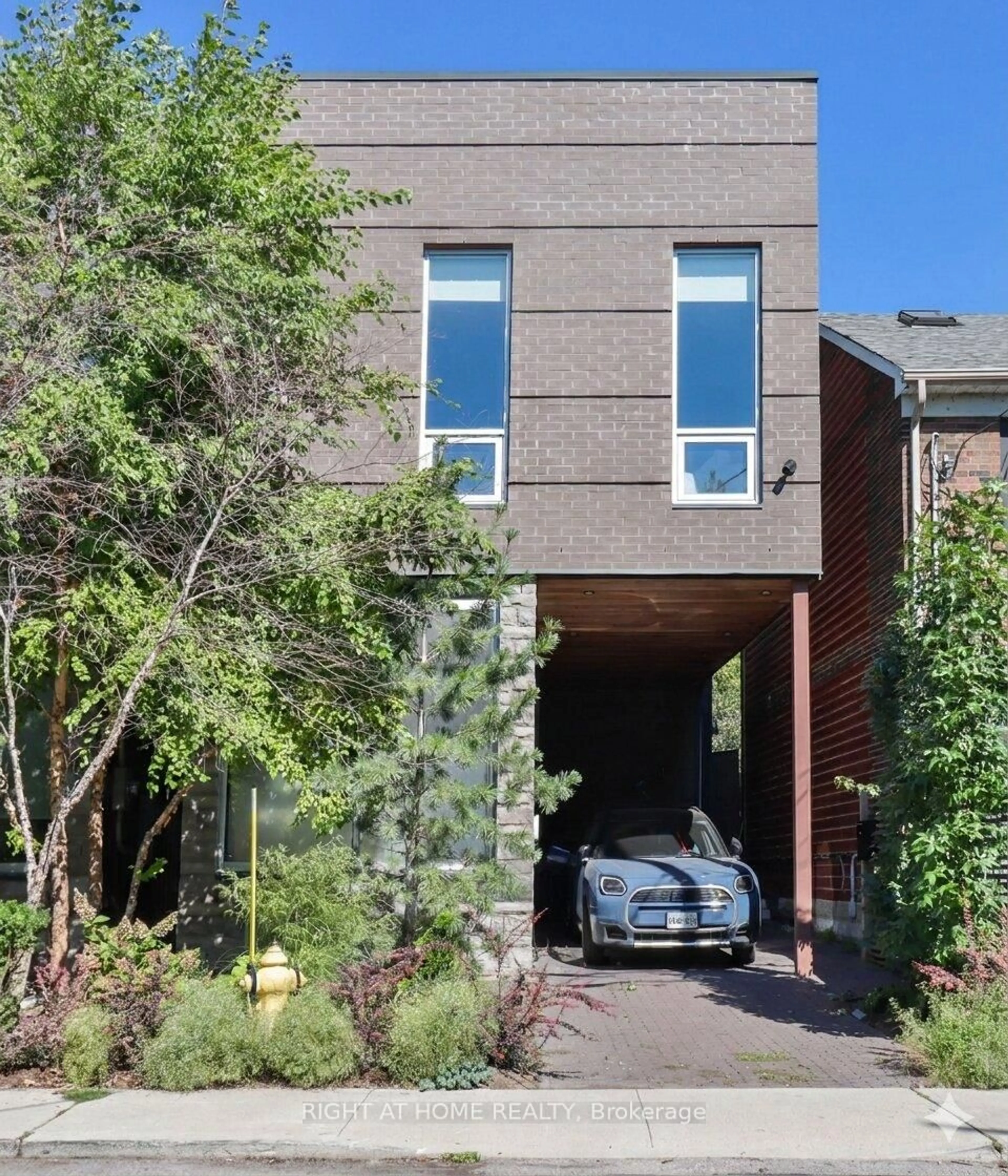 Home with brick exterior material, street for 18 Mitchell Ave, Toronto Ontario M6J 1B9