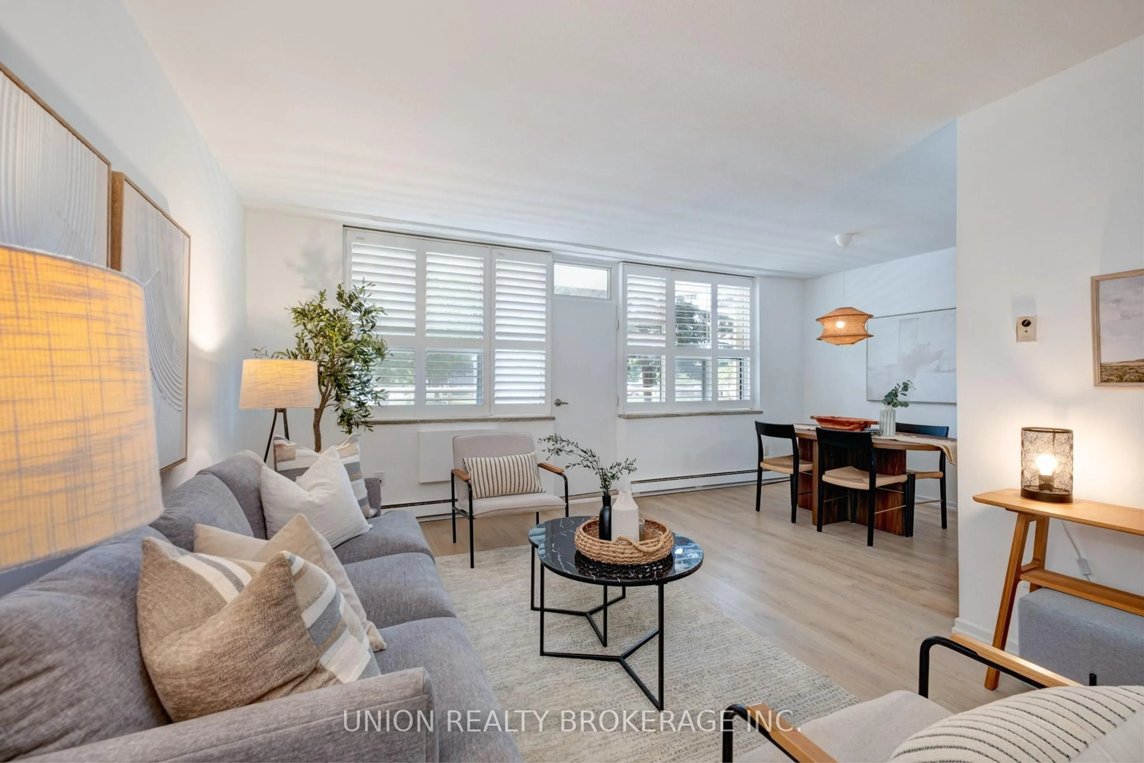 Living room with furniture, wood/laminate floor for 70 Old Sheppard Ave #103, Toronto Ontario M2J 3L6