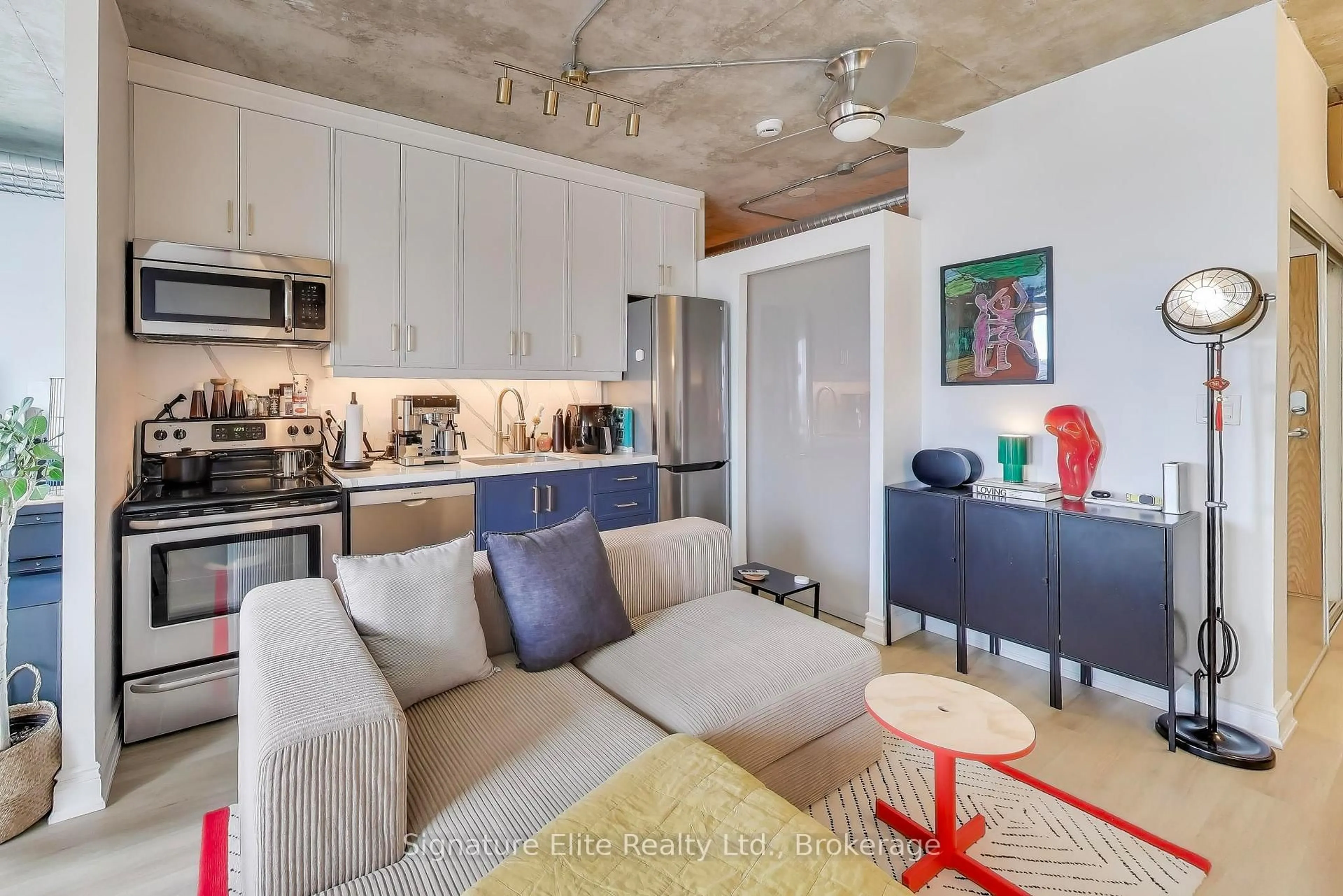 Open concept kitchen, cement floor for 150 Sudbury St #1703, Toronto Ontario M6J 3S8