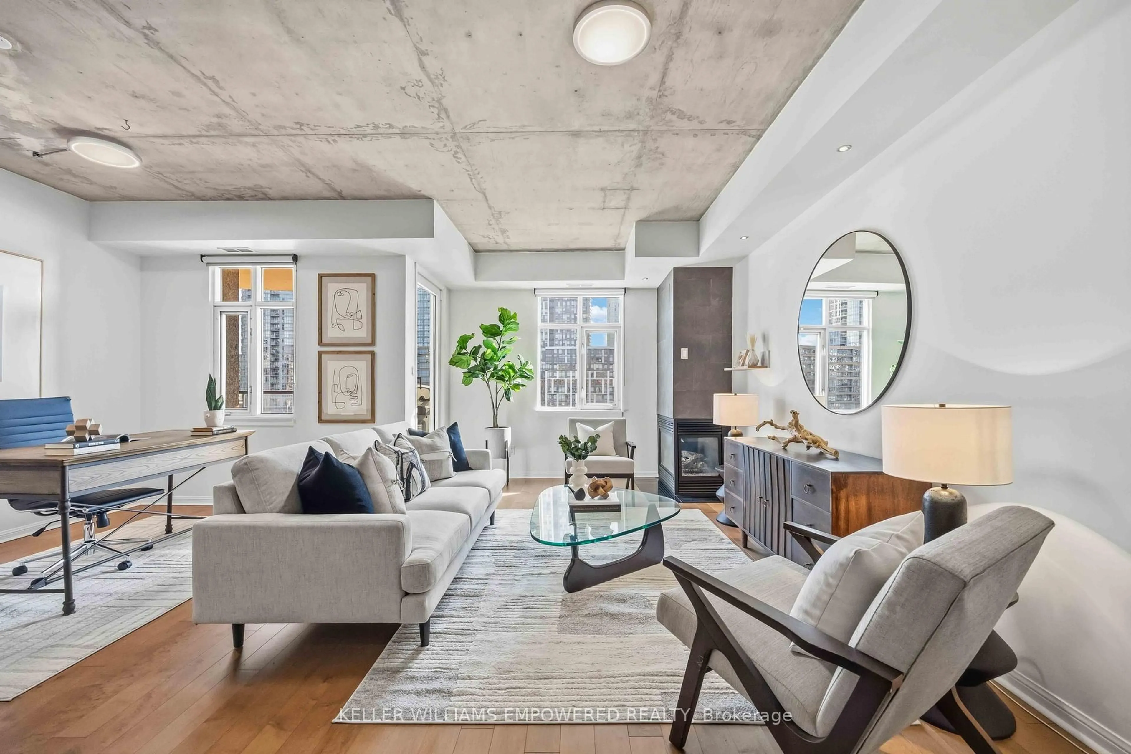 Living room with furniture, cement floor for 550 Front St #401, Toronto Ontario M5V 3N5