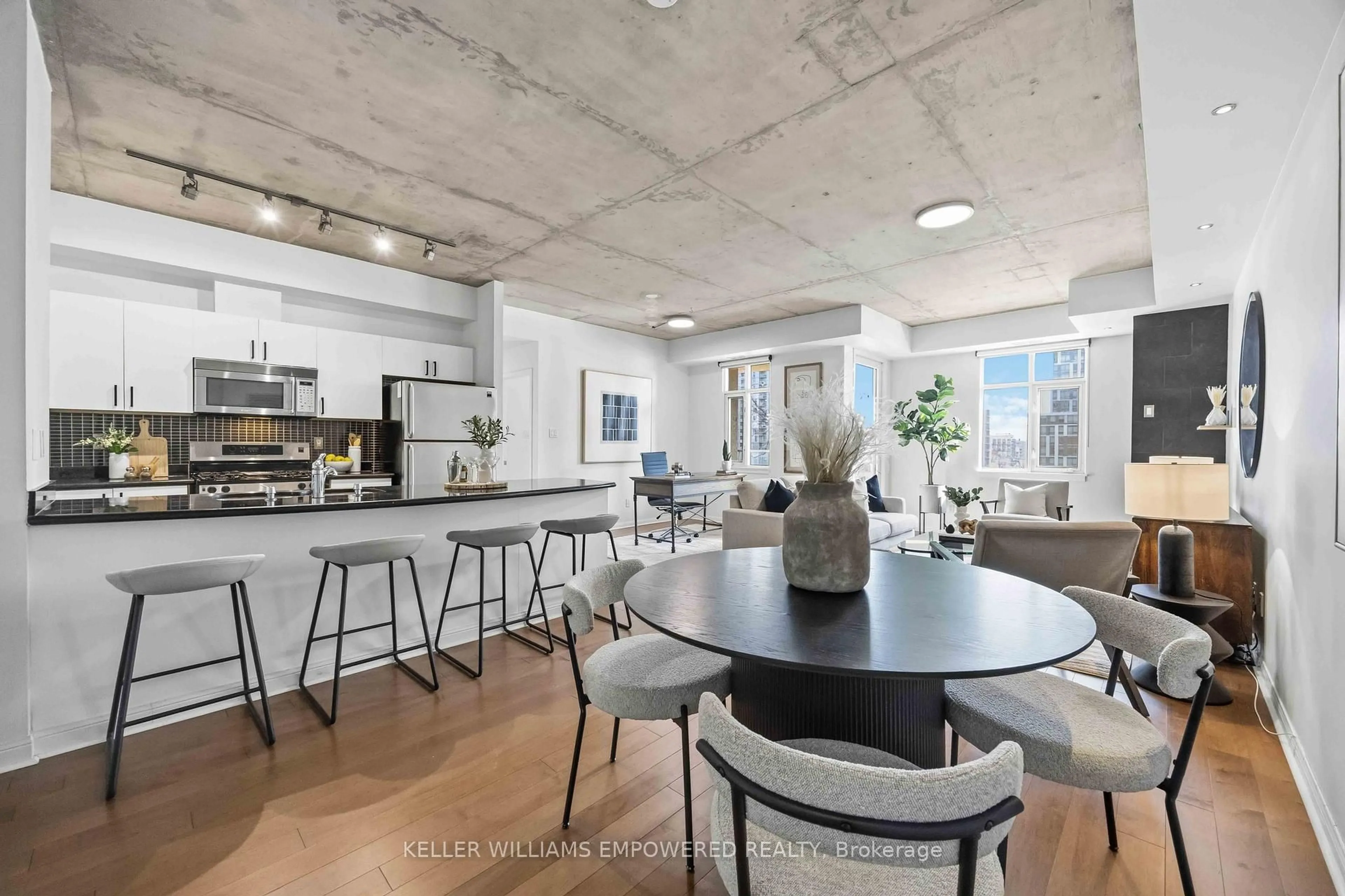 Open concept kitchen, cement floor for 550 Front St #401, Toronto Ontario M5V 3N5