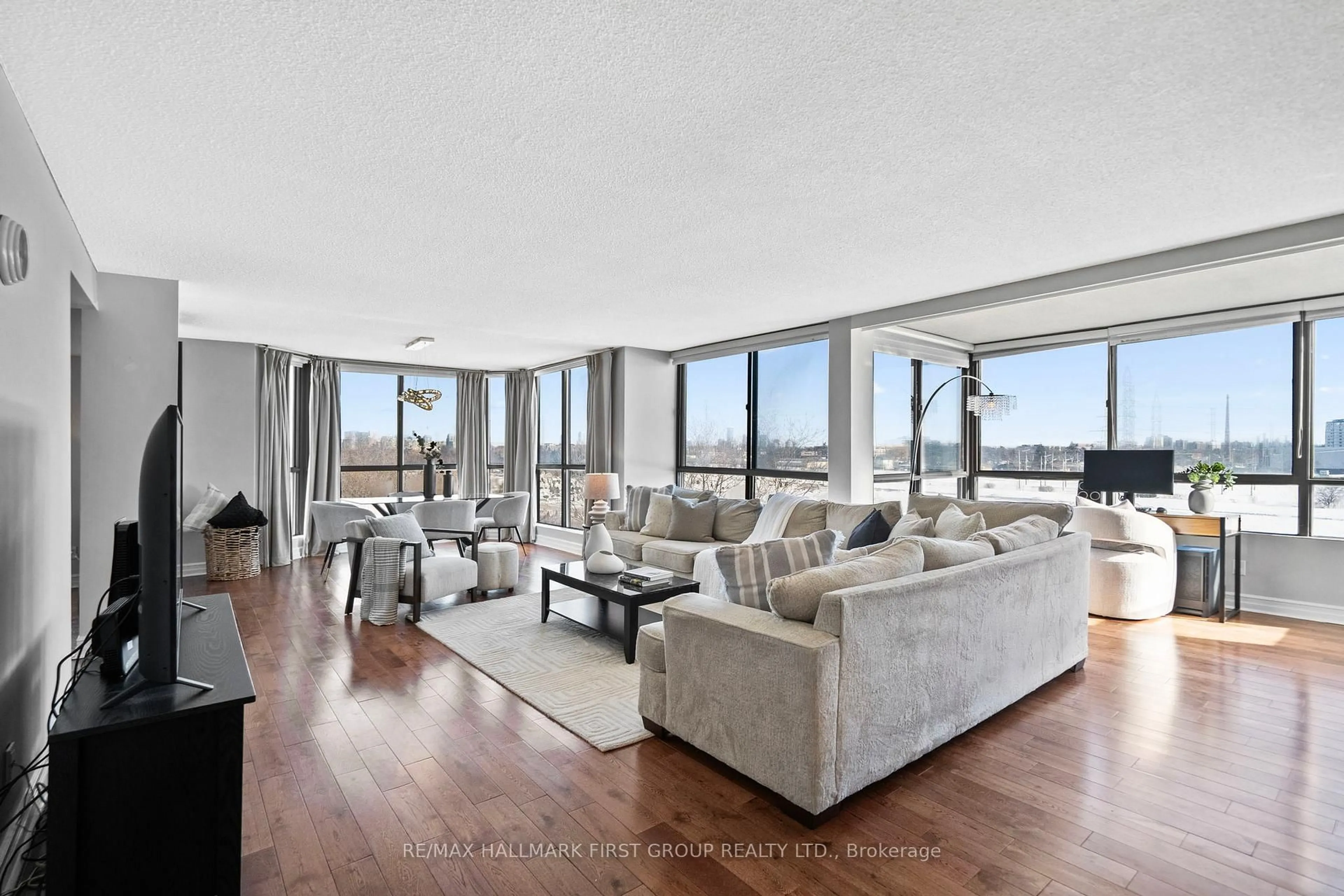 Living room with furniture, unknown for 131 Torresdale Ave #707, Toronto Ontario M2R 3T1