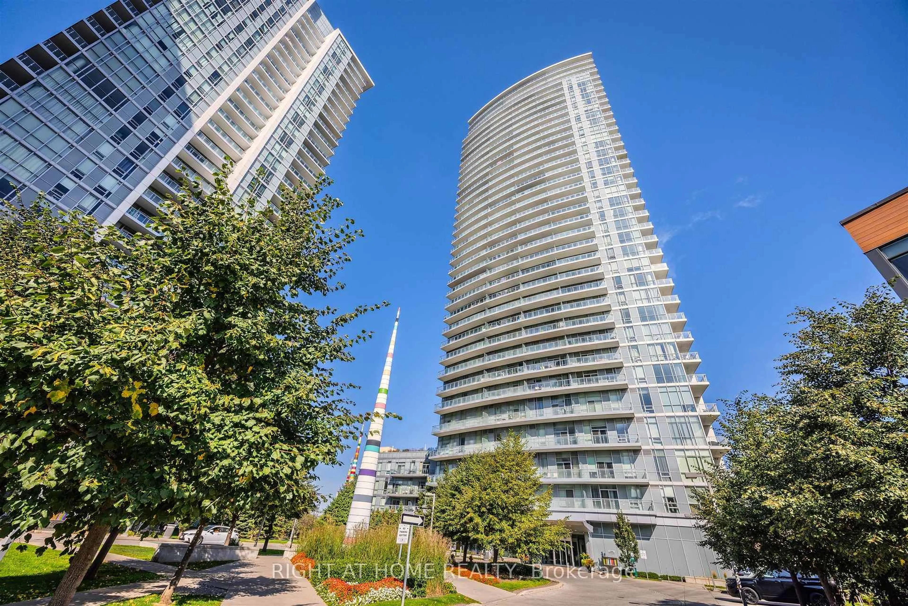 Patio, city buildings view from balcony for 70 Forest Manor Rd #206, Toronto Ontario M2J 0A9