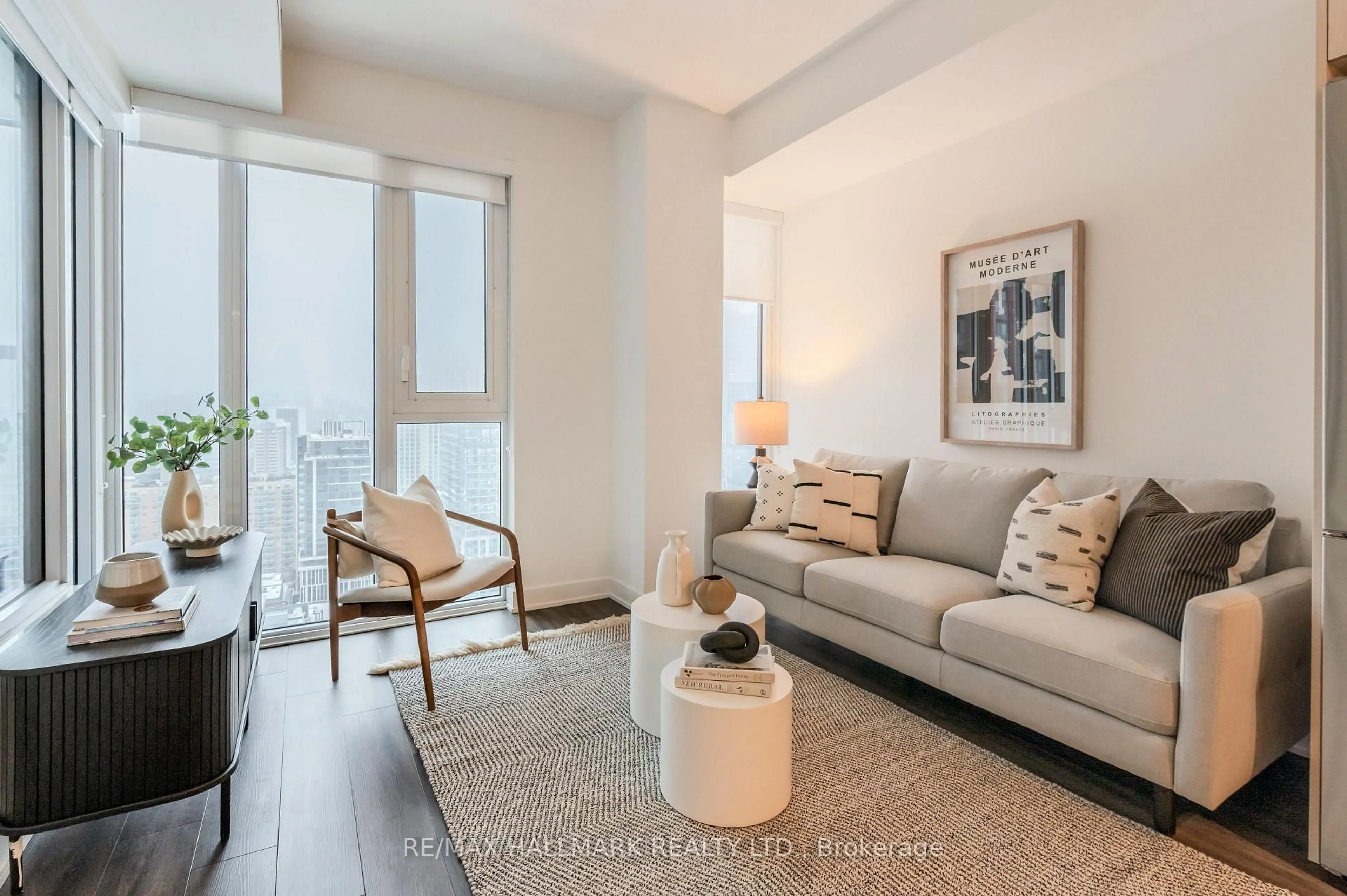 Living room with furniture, unknown for 70 Princess St #2401 E, Toronto Ontario M5A 0X6