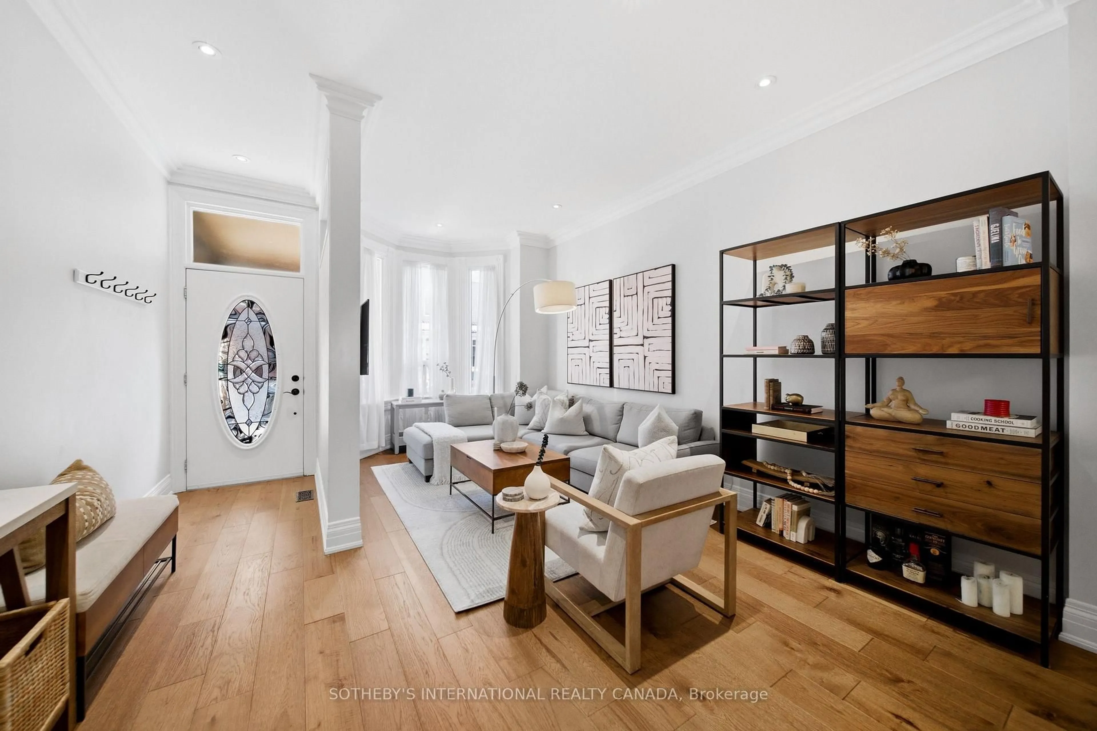 Living room with furniture, wood/laminate floor for 12 Atkins Ave, Toronto Ontario M6K 1W1