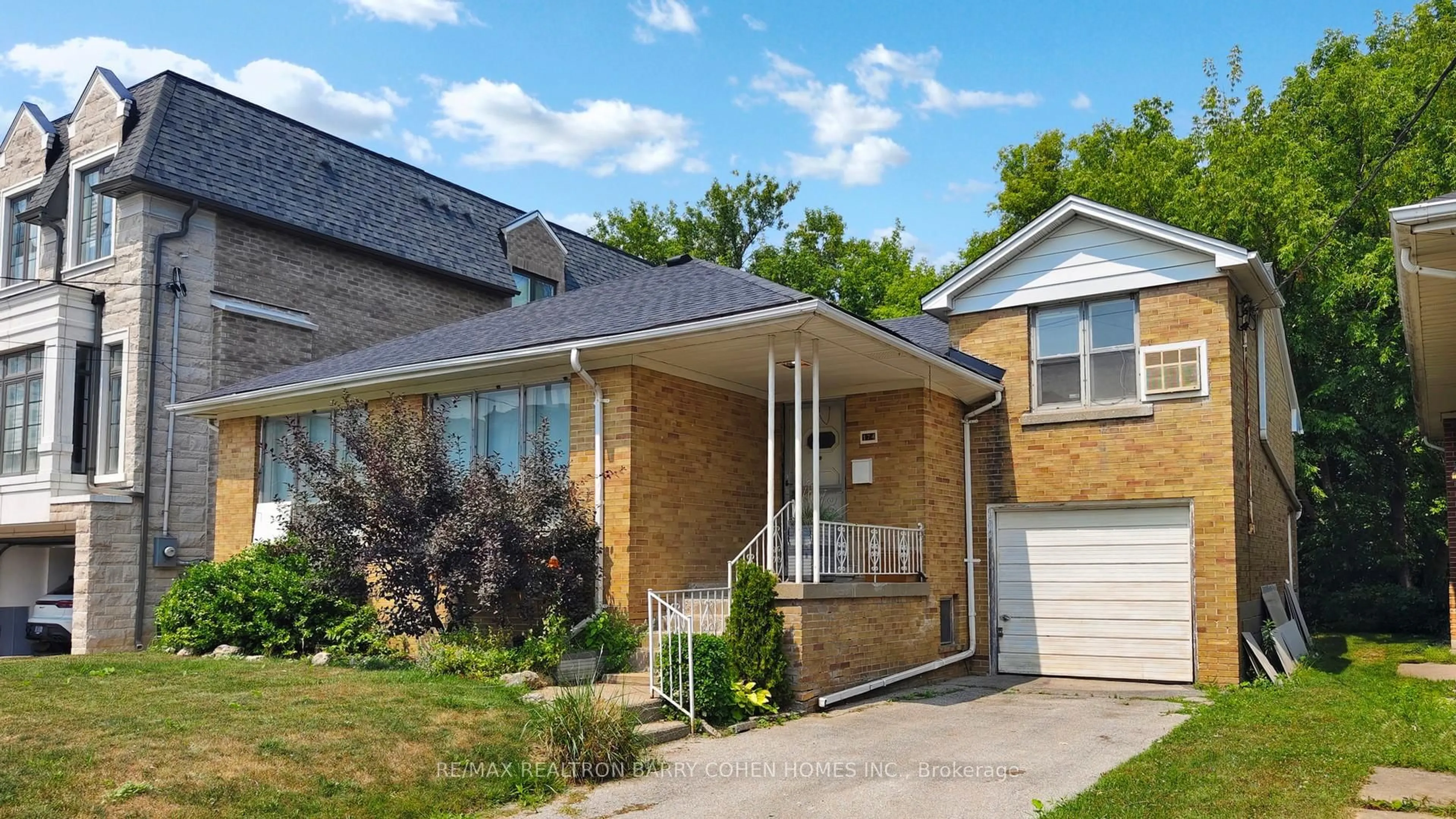 Home with brick exterior material, street for 174 Caribou Rd, Toronto Ontario M5N 2B6
