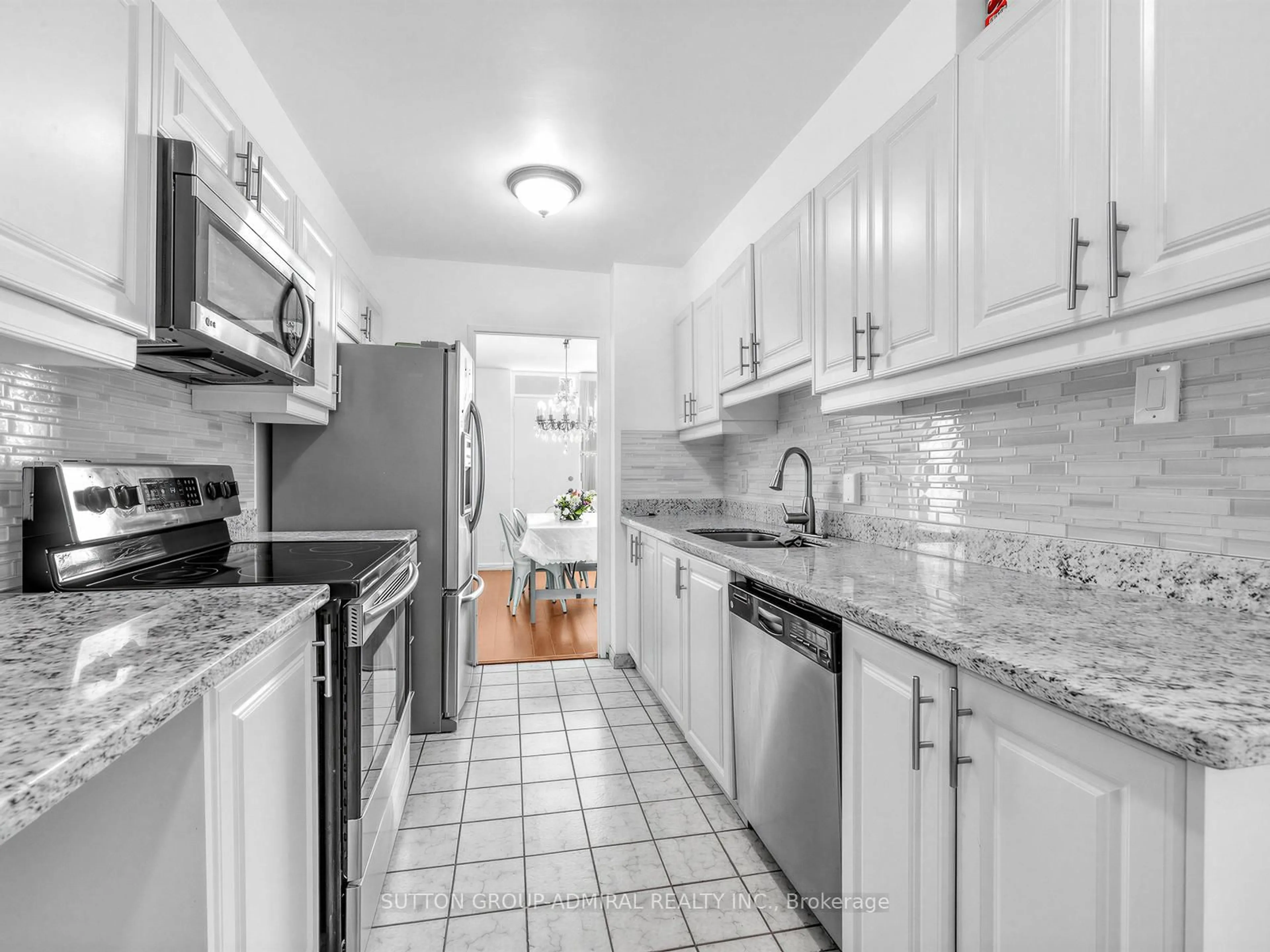Standard kitchen, ceramic/tile floor for 130 Neptune Dr #505, Toronto Ontario M6A 1X5