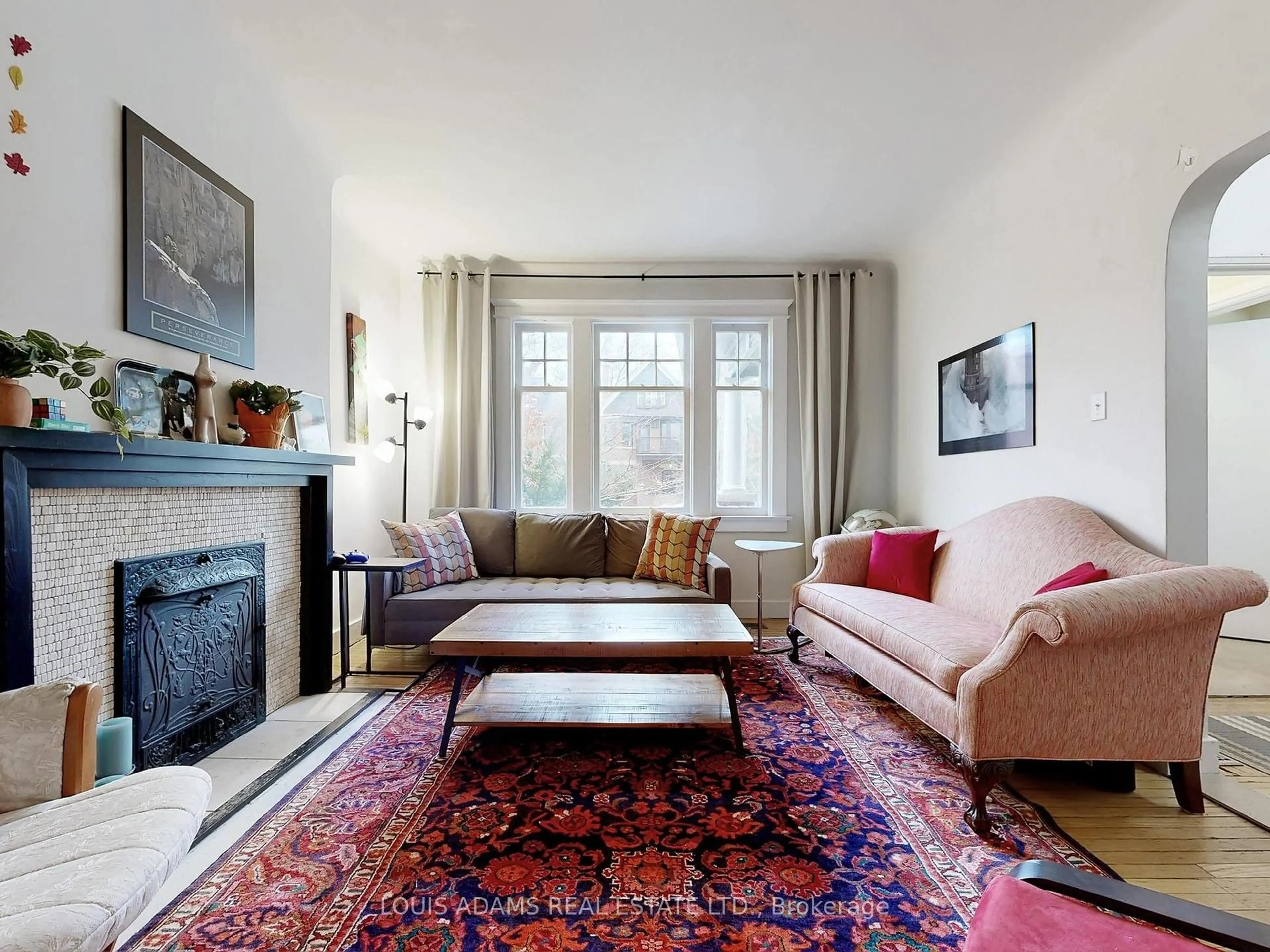 Living room with furniture, carpet floor for 499 Palmerston Blvd, Toronto Ontario M6G 2P2