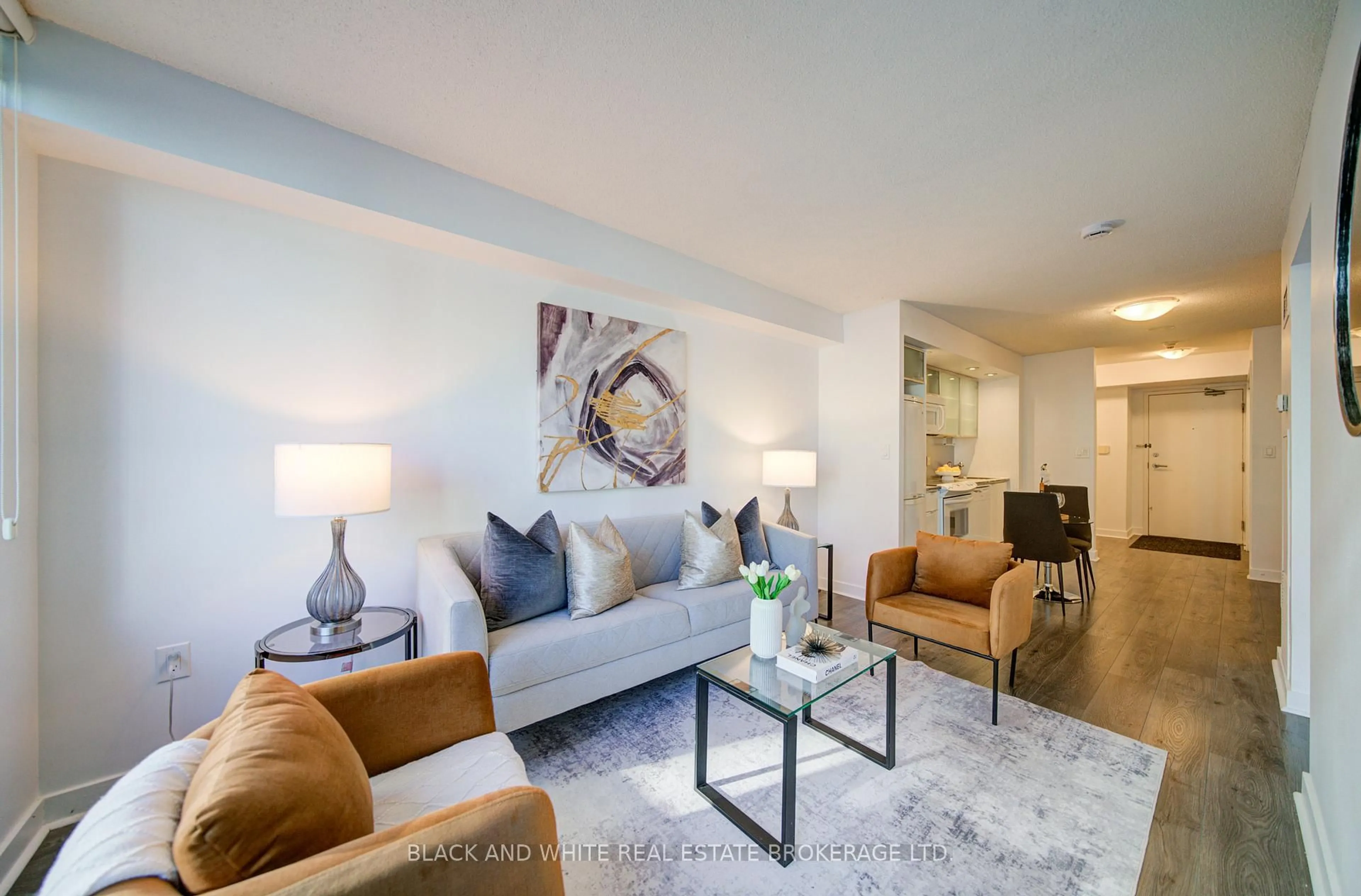 Living room with furniture, unknown for 25 Telegram Mews #1003, Toronto Ontario M5V 3Z1