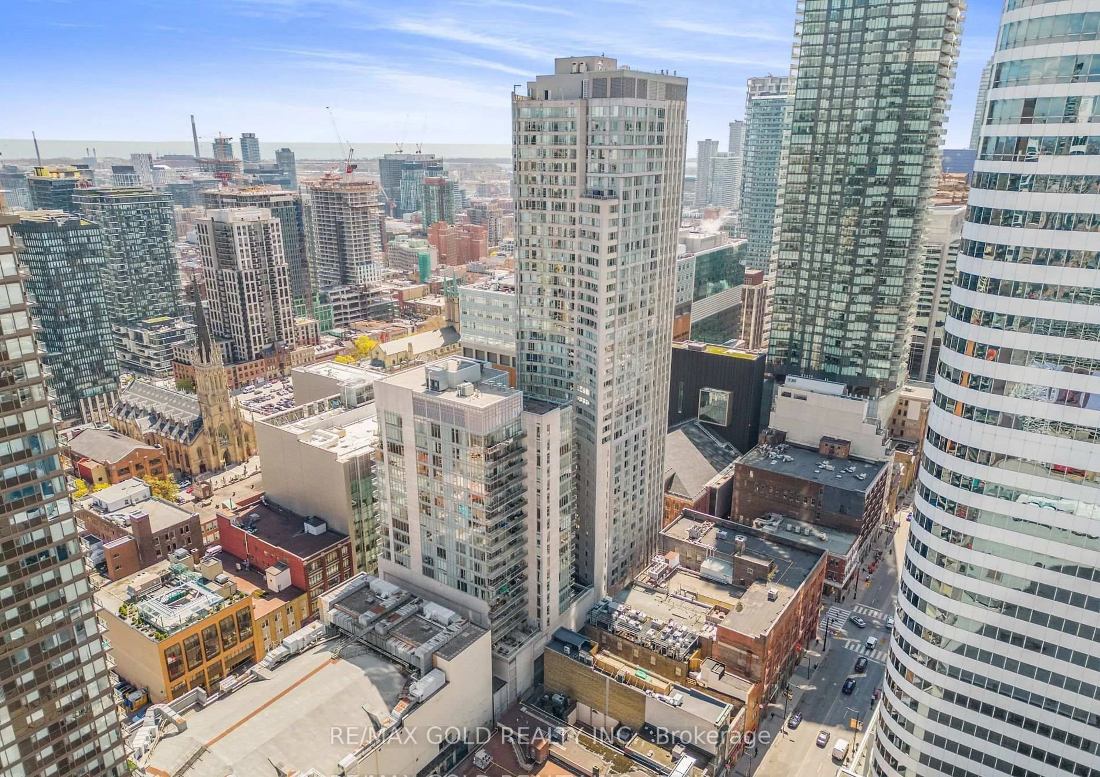A pic from outside/outdoor area/front of a property/back of a property/a pic from drone, city buildings view from balcony for 200 Victoria St #1506, Toronto Ontario M5B 1V8