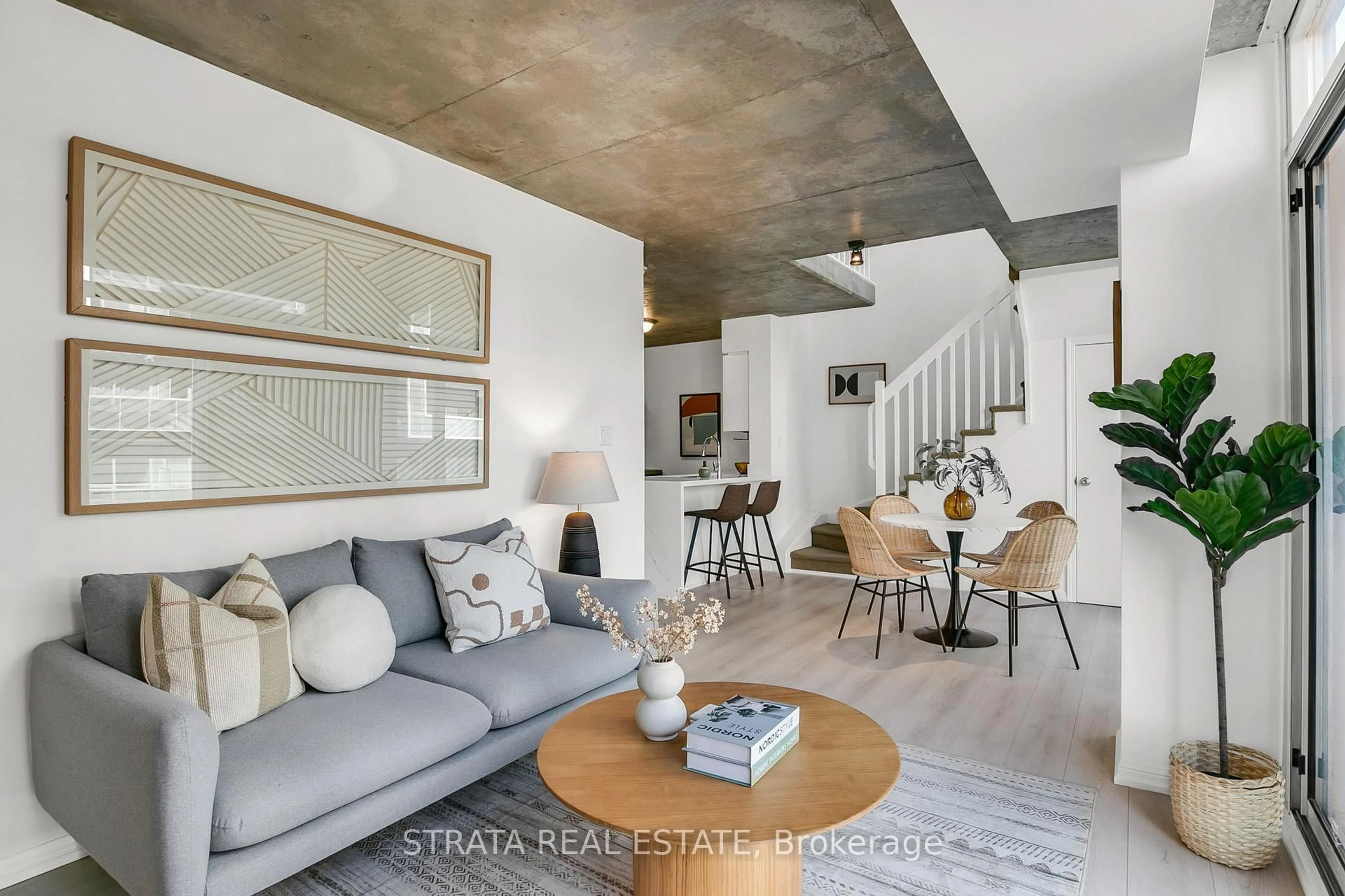 Living room with furniture, cement floor for 1029 King St #629, Toronto Ontario M6K 3M9