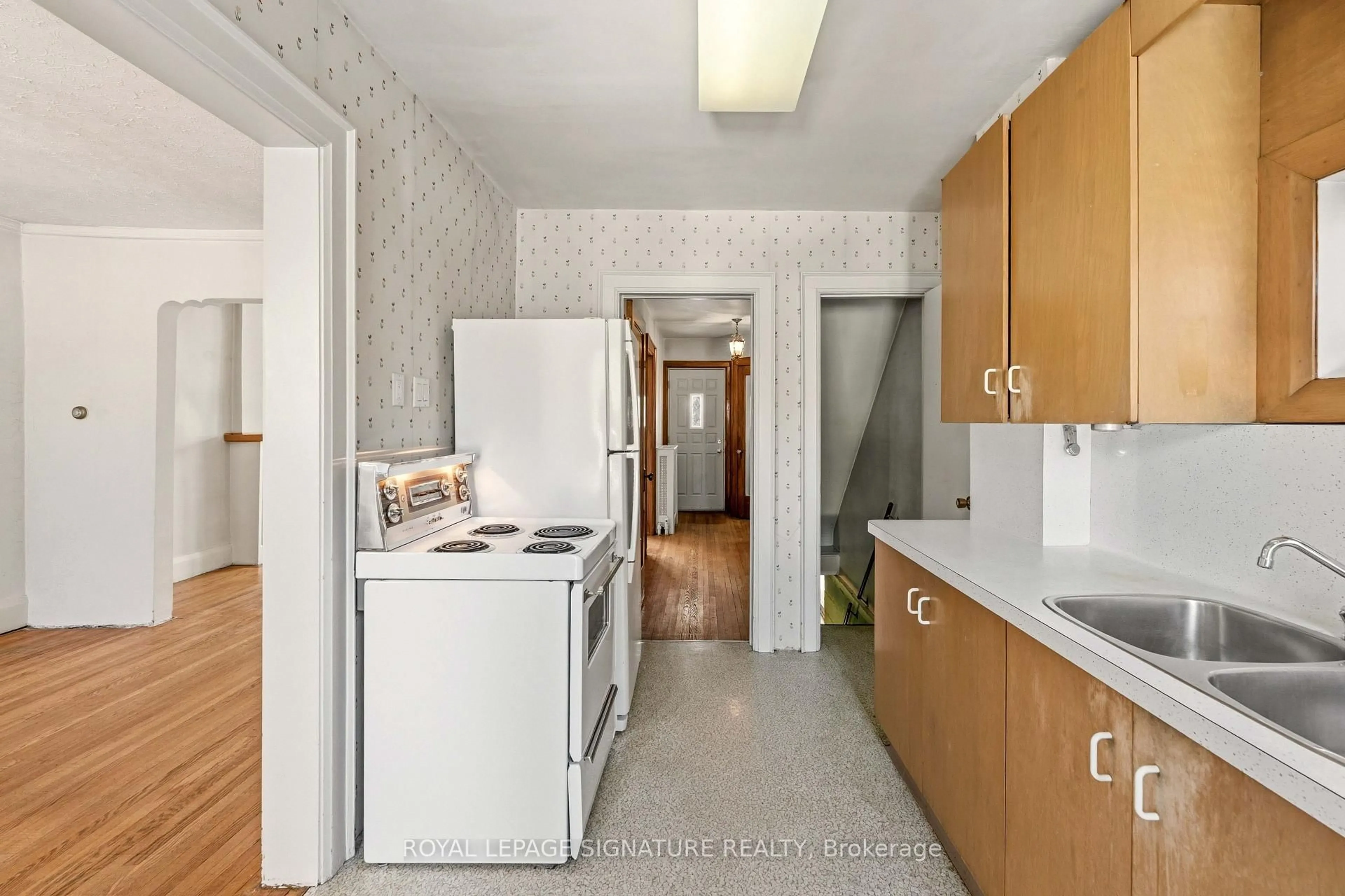 Kitchen with laundary machines, unknown for 212 Cranbrooke Ave, Toronto Ontario M5M 1M7