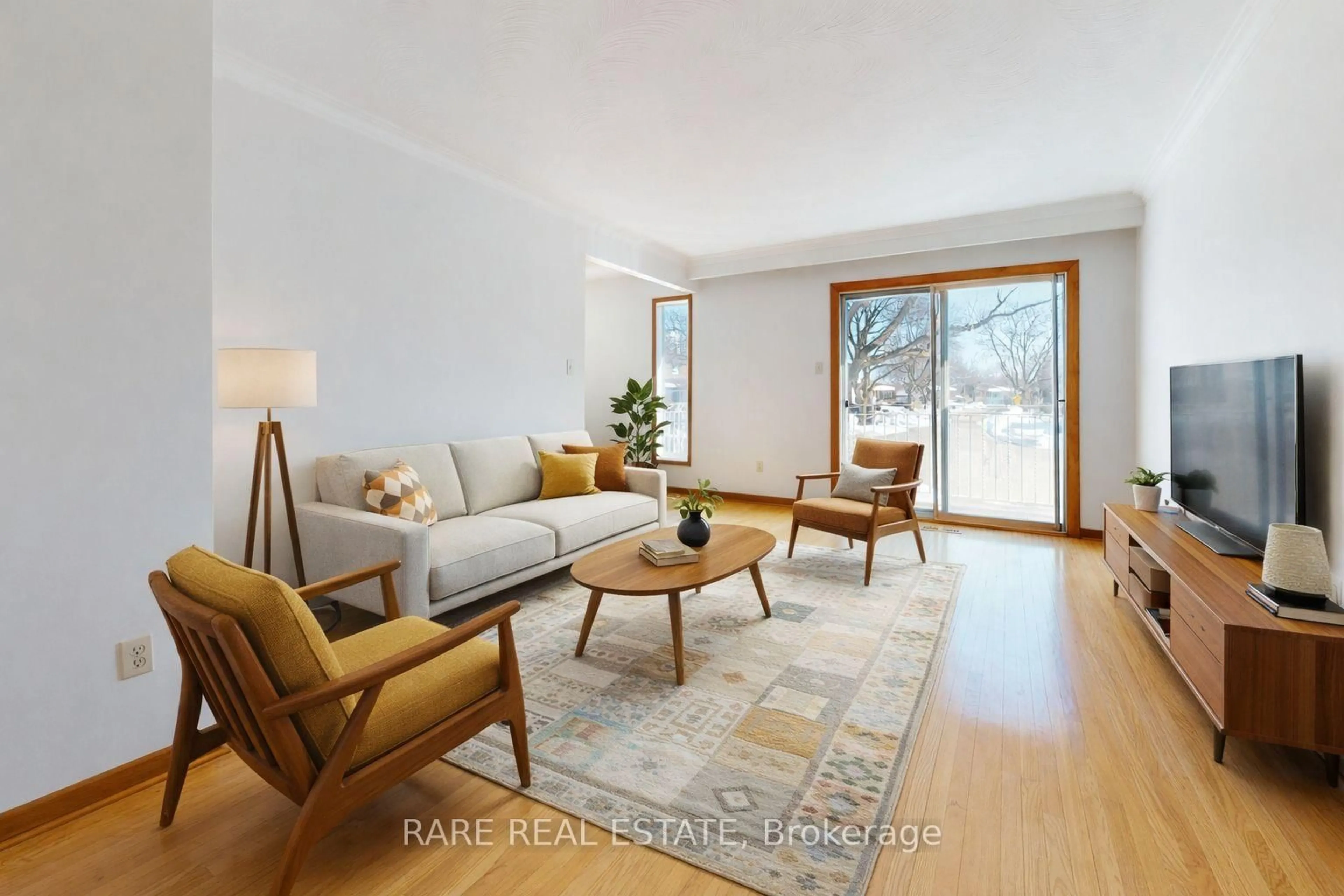 Living room with furniture, wood/laminate floor for 87 Pindar Cres, Toronto Ontario M2J 3L3