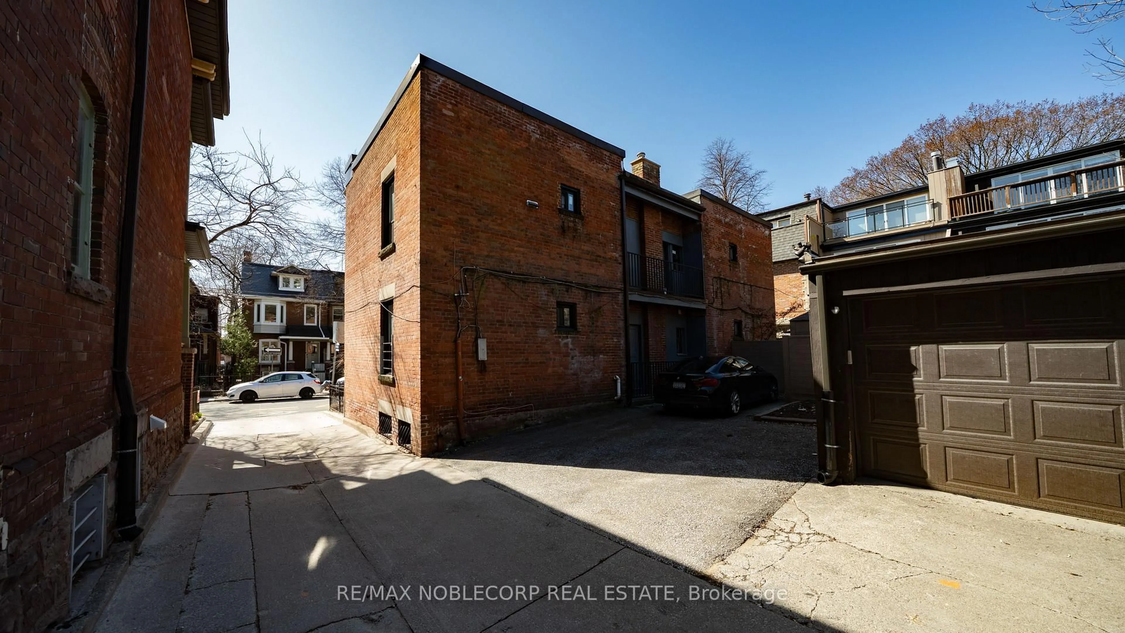 A pic from outside/outdoor area/front of a property/back of a property/a pic from drone, street for 34 Winchester St, Toronto Ontario M4X 1A7