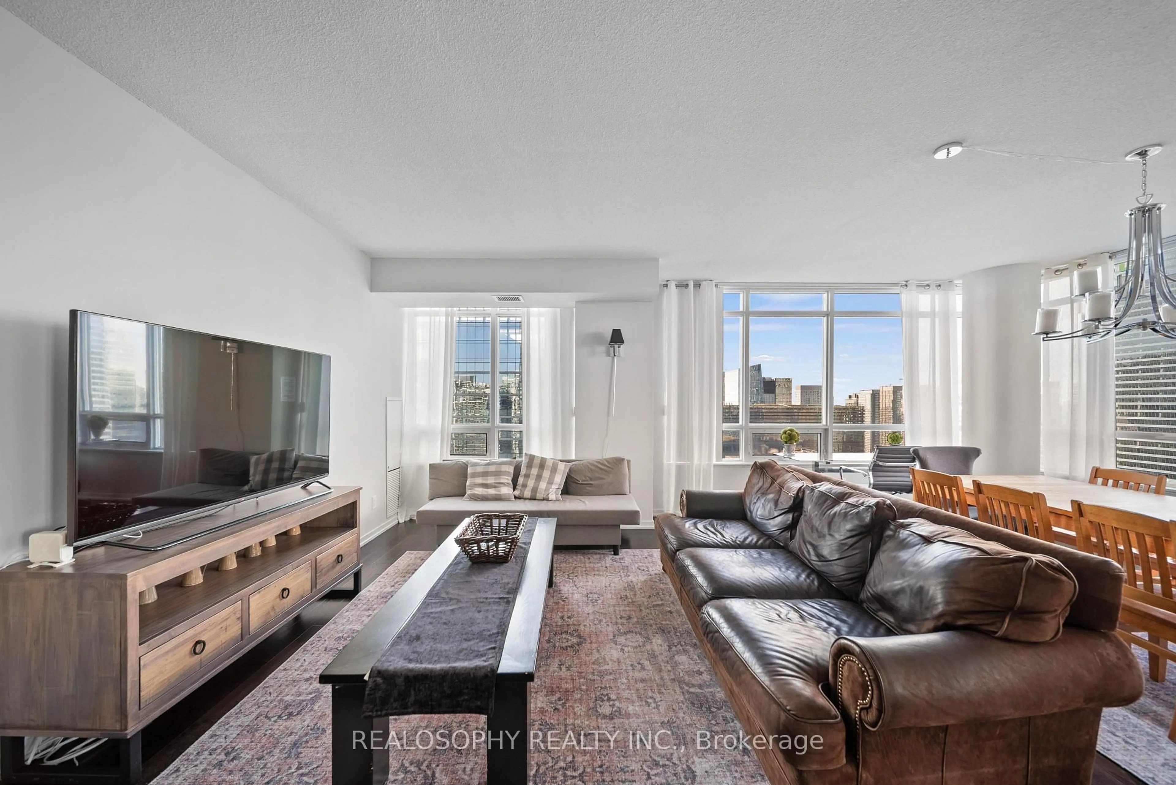 Living room with furniture, unknown for 65 Bremner Blvd #4305, Toronto Ontario M5J 0A7