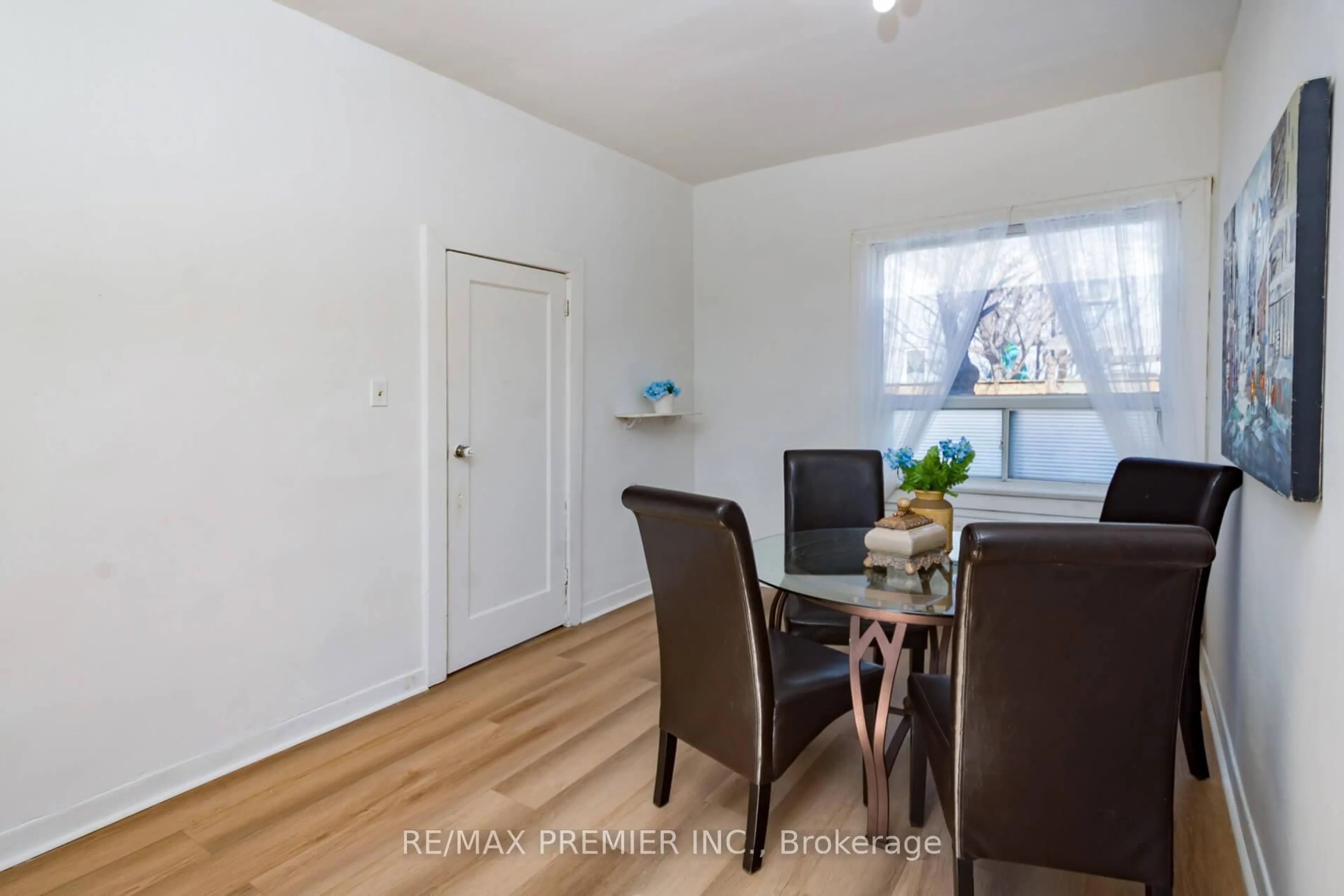 Dining room, wood/laminate floor for 229 Bellwoods Ave, Toronto Ontario M6J 2R2