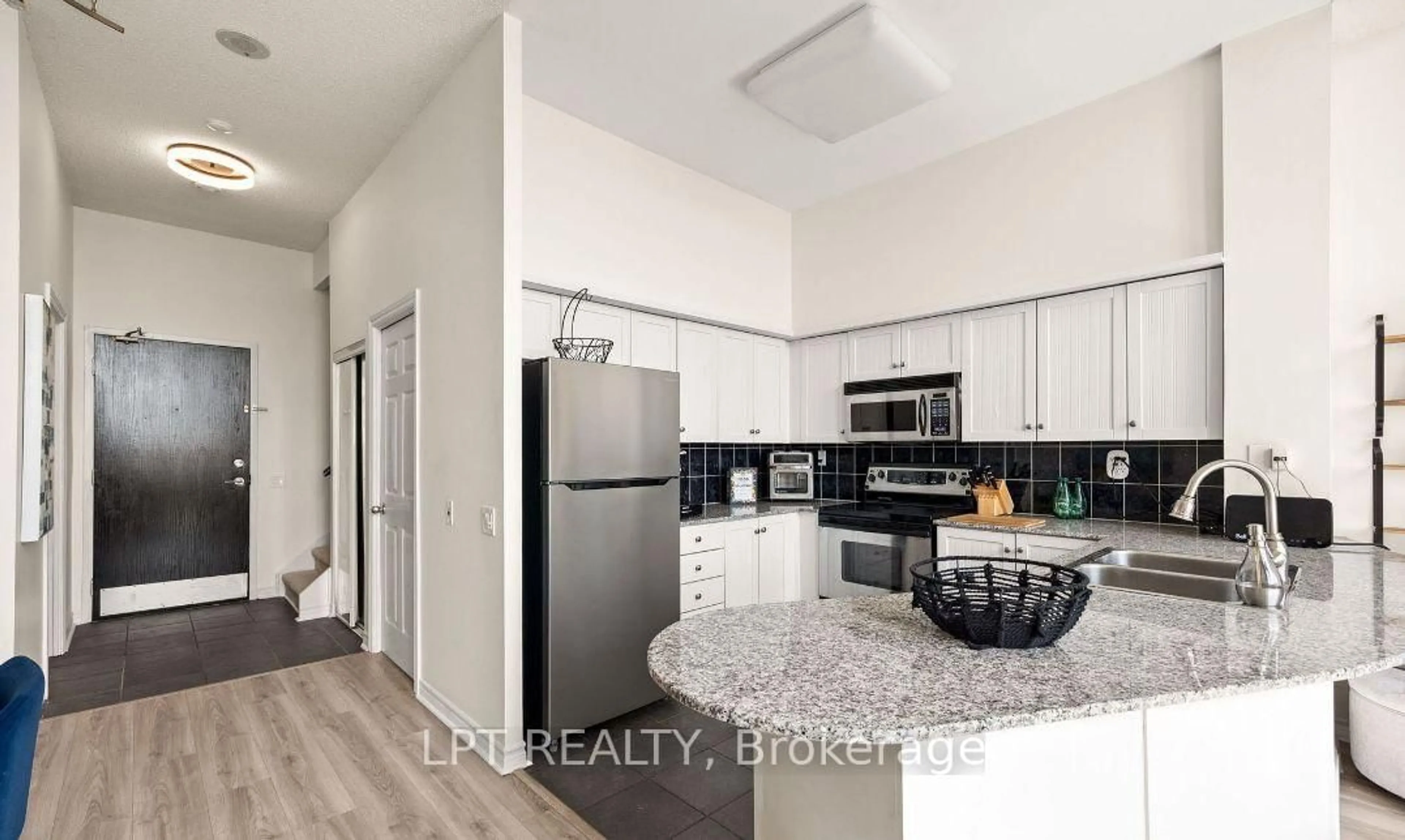 Open concept kitchen, ceramic/tile floor for 1720 Eglinton Ave #108, Toronto Ontario M4A 1J7