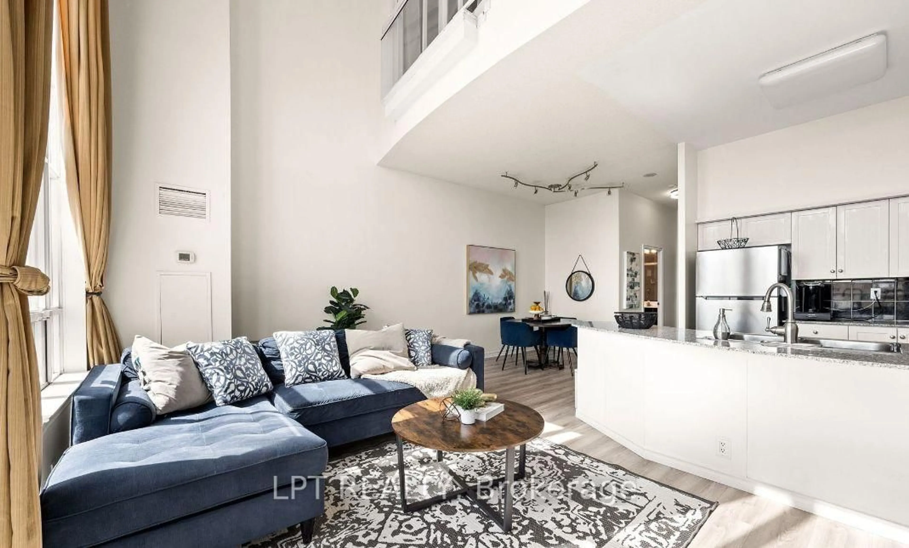 Living room with furniture, unknown for 1720 Eglinton Ave #108, Toronto Ontario M4A 1J7