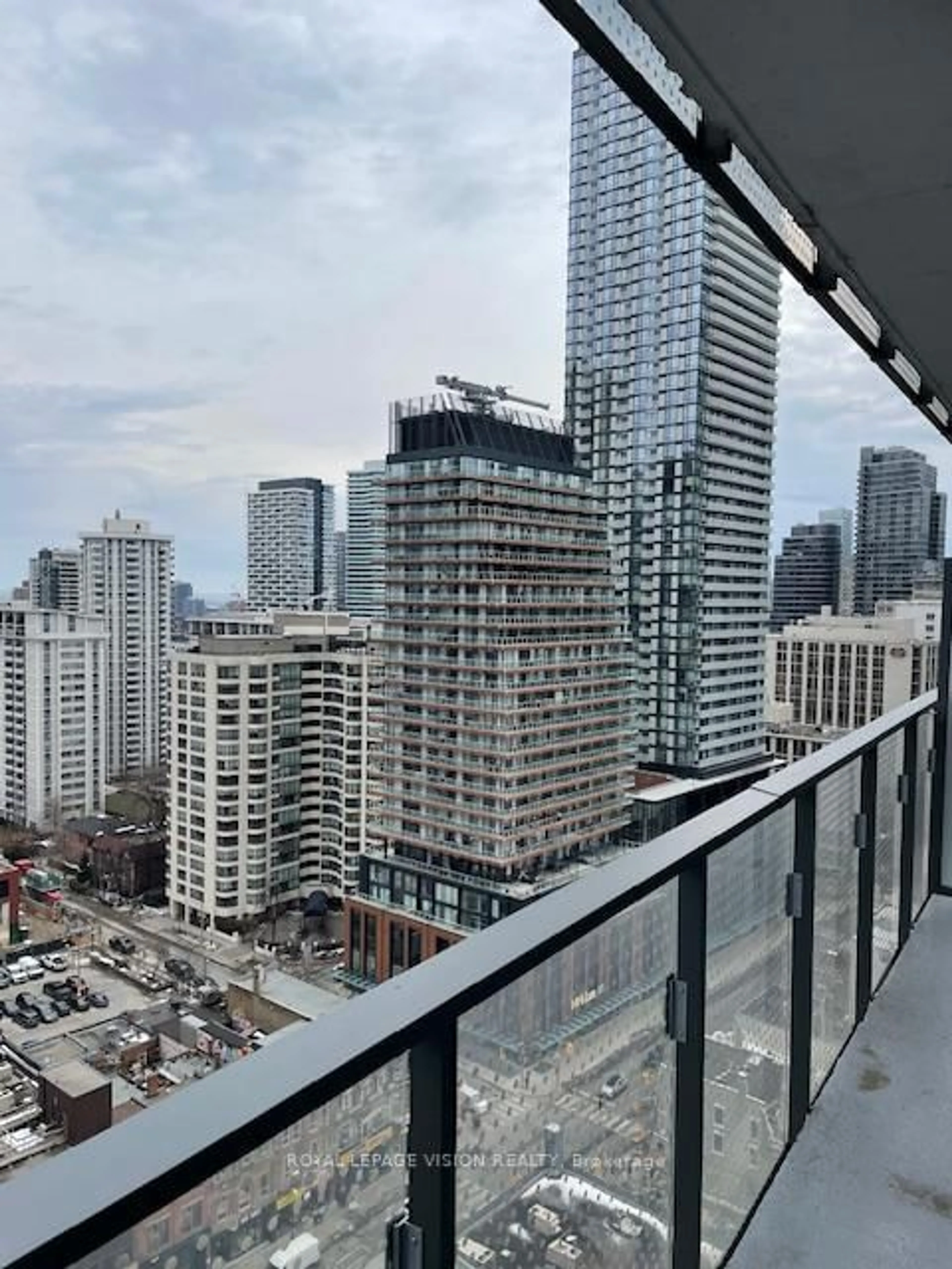 Balcony in the apartment, city buildings view from balcony for 11 Wellesley St #1701, Toronto Ontario M4Y 0G4