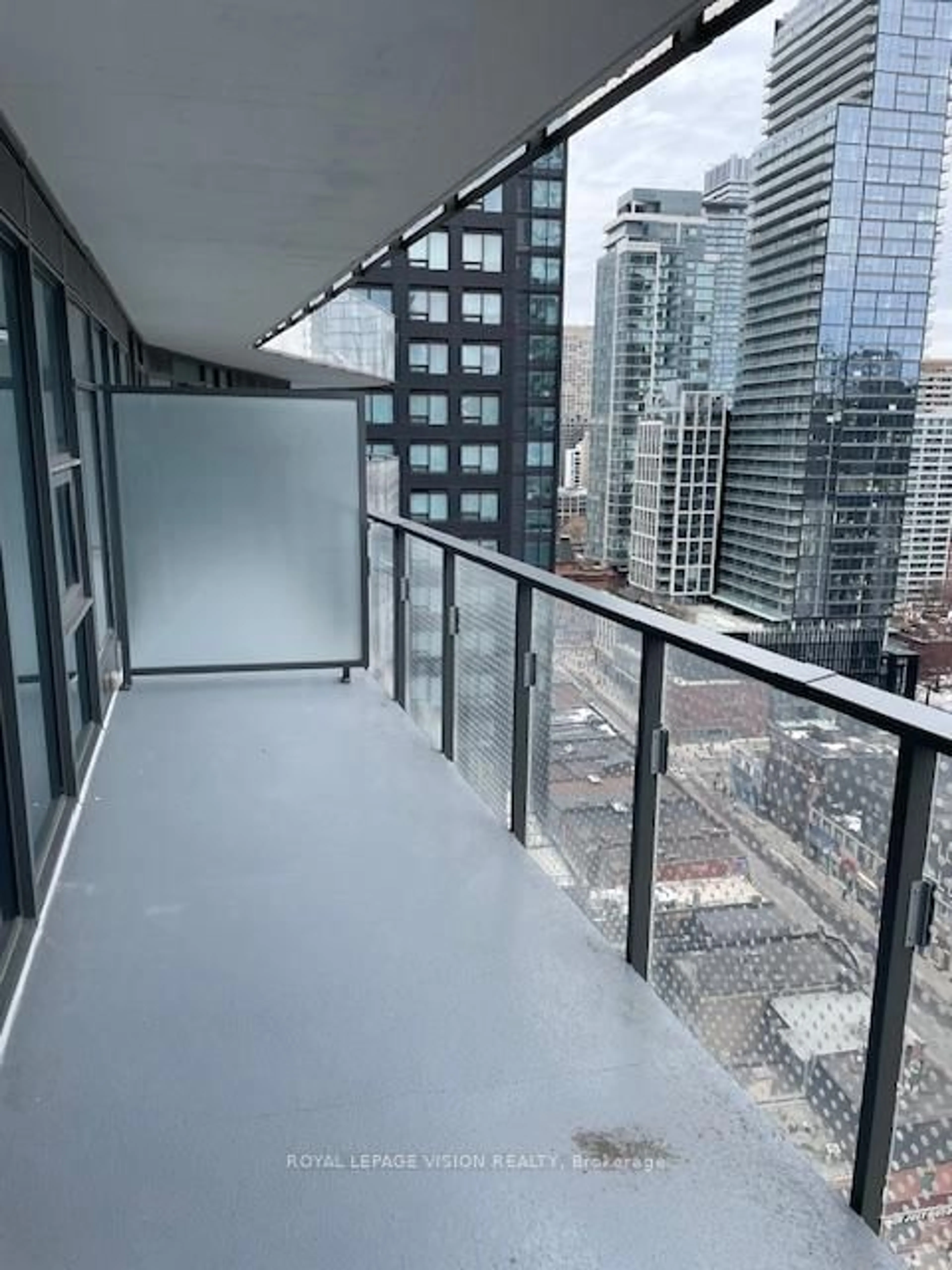 Balcony in the apartment, city buildings view from balcony for 11 Wellesley St #1701, Toronto Ontario M4Y 0G4
