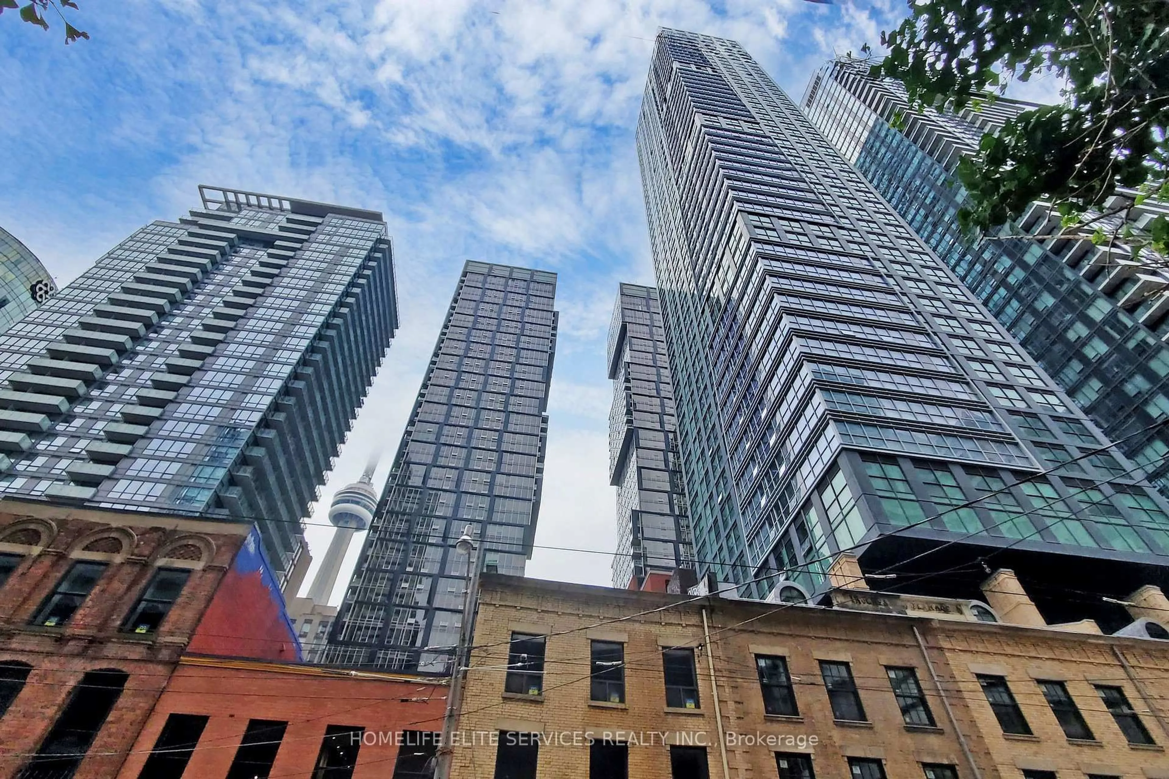 A pic from outside/outdoor area/front of a property/back of a property/a pic from drone, city buildings view from balcony for 327 King St #702, Toronto Ontario M5V 0W7