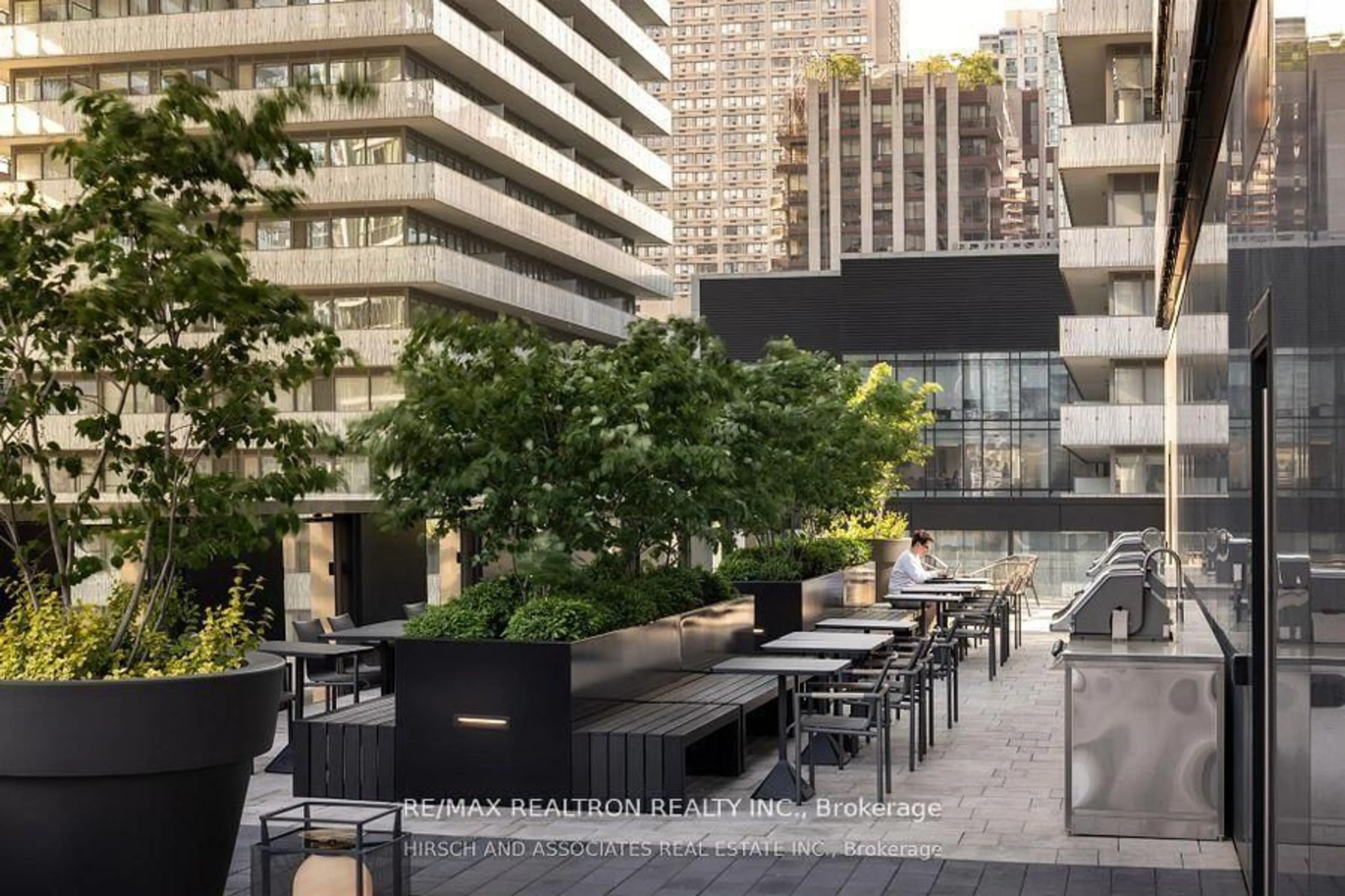 Patio, city buildings view from balcony for 55 Charles St #803, Toronto Ontario M4Y 0J1