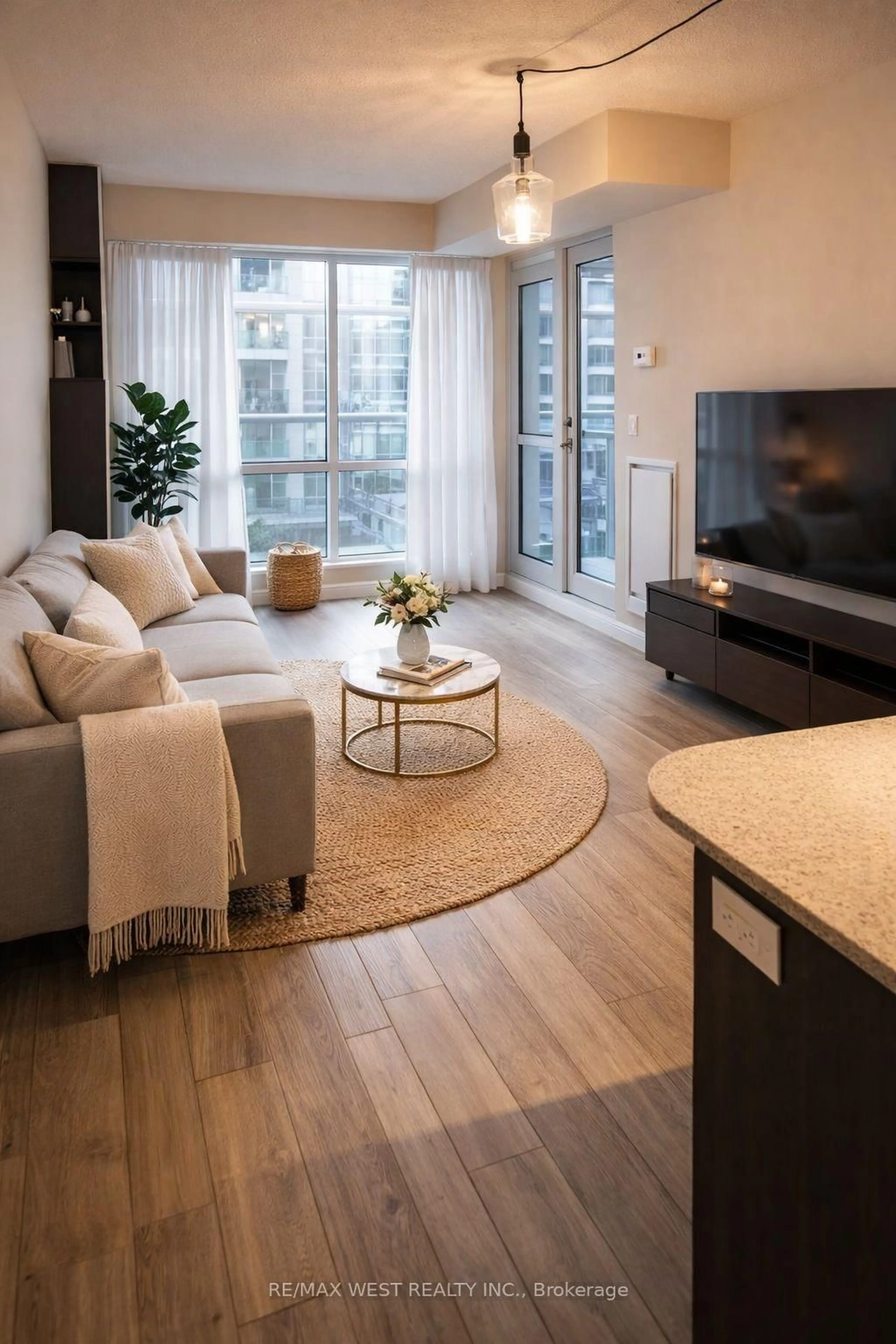 Living room with furniture, unknown for 38 Grand Magazine St #342, Toronto Ontario M5V 0B1