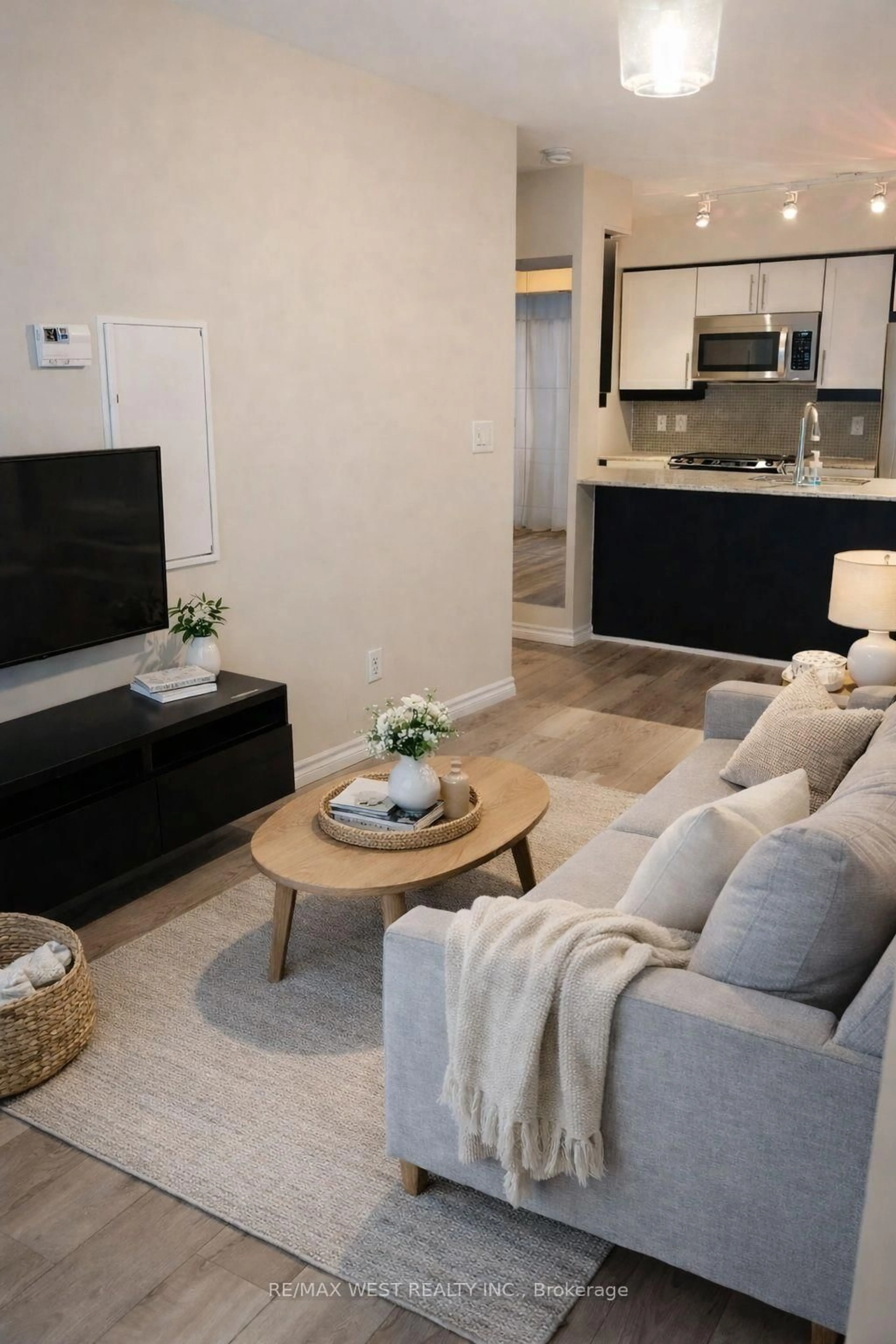 Living room with furniture, unknown for 38 Grand Magazine St #342, Toronto Ontario M5V 0B1