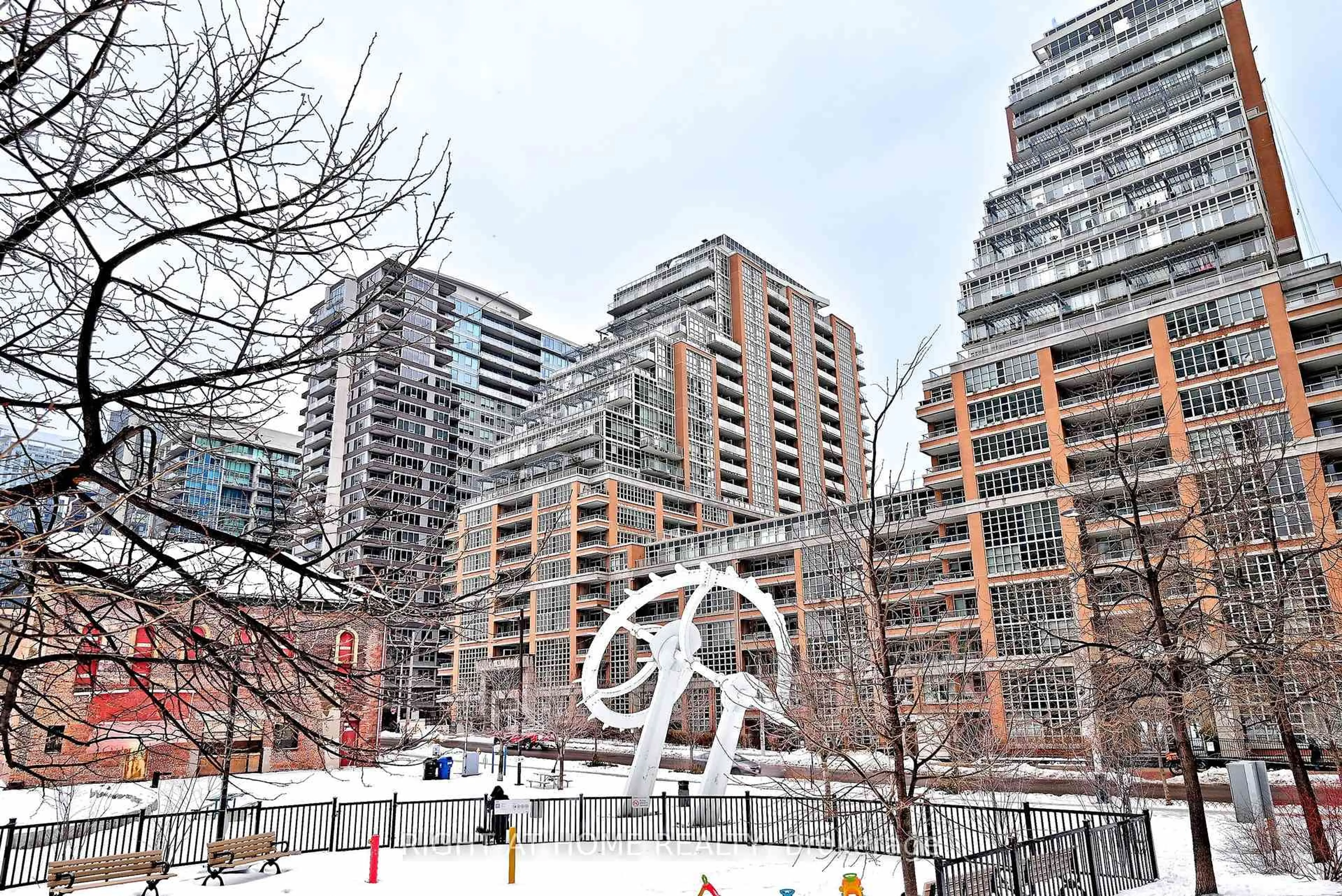 Patio, city buildings view from balcony for 65 East Liberty St #2306, Toronto Ontario M6K 3R2