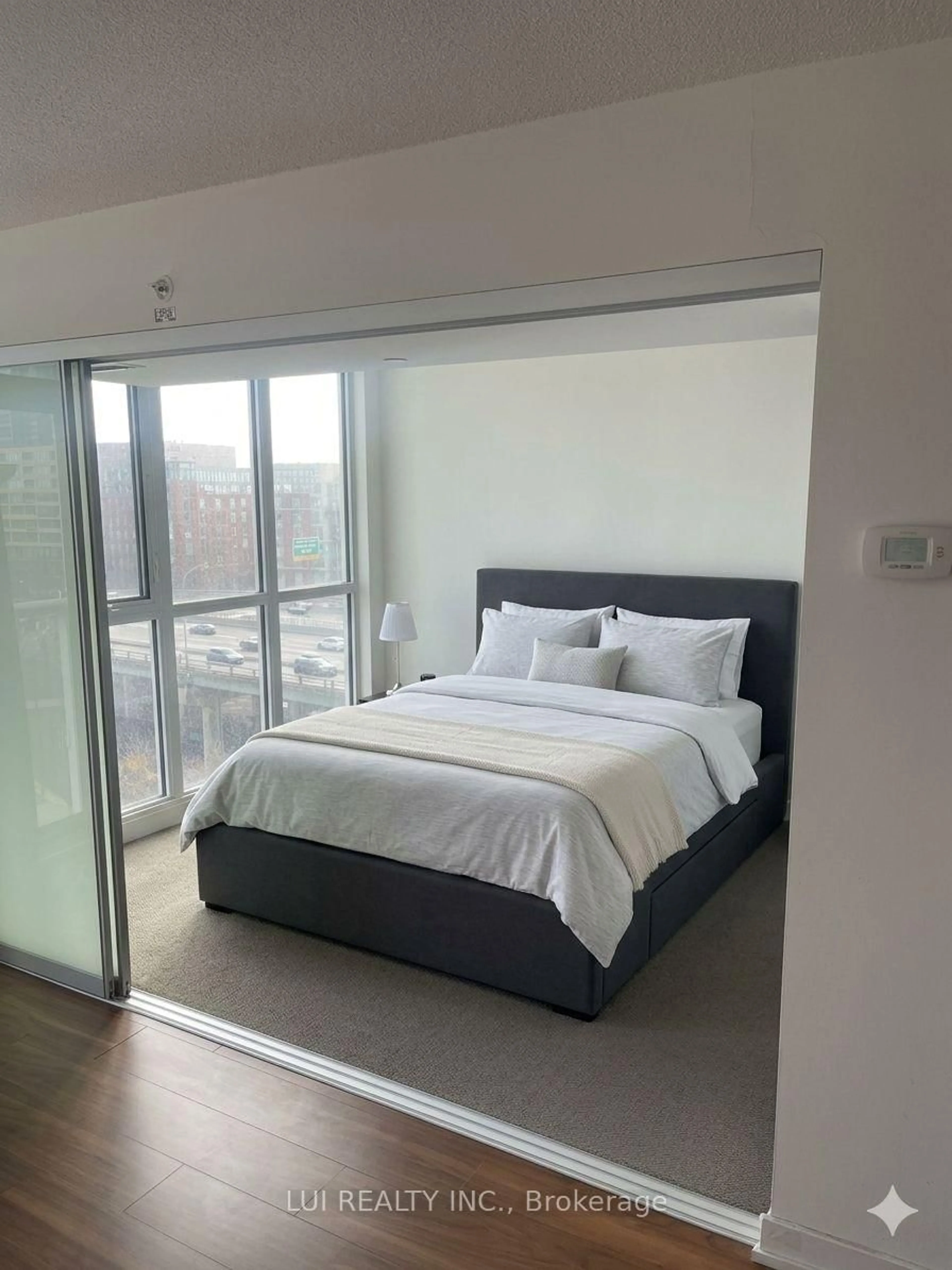 Bedroom with bed, unknown for 75 queens wharf Rd #903, Toronto Ontario M5V 0J8