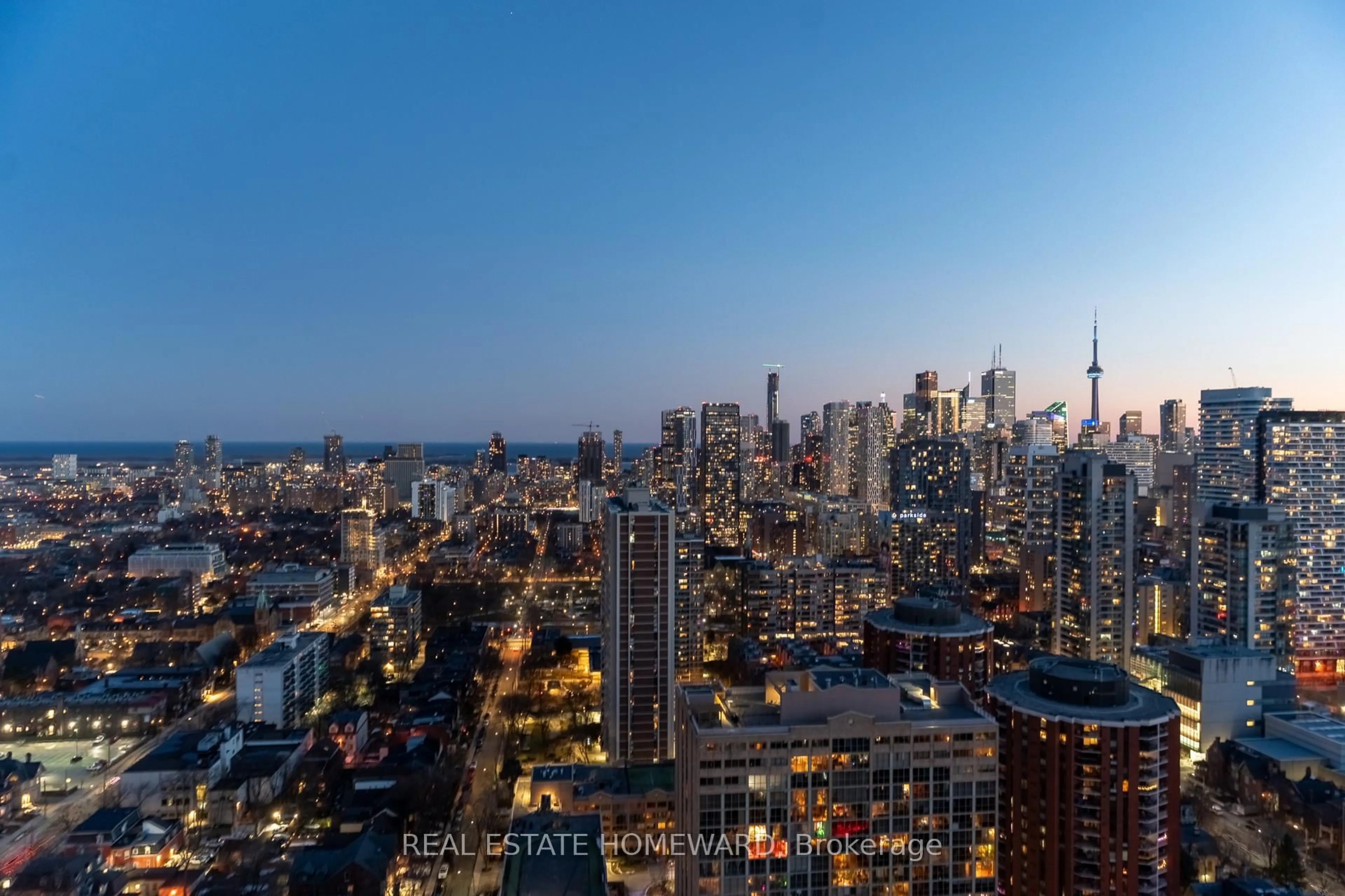 A pic from outside/outdoor area/front of a property/back of a property/a pic from drone, city buildings view from balcony for 120 Homewood Ave #3408, Toronto Ontario M4Y 2J3