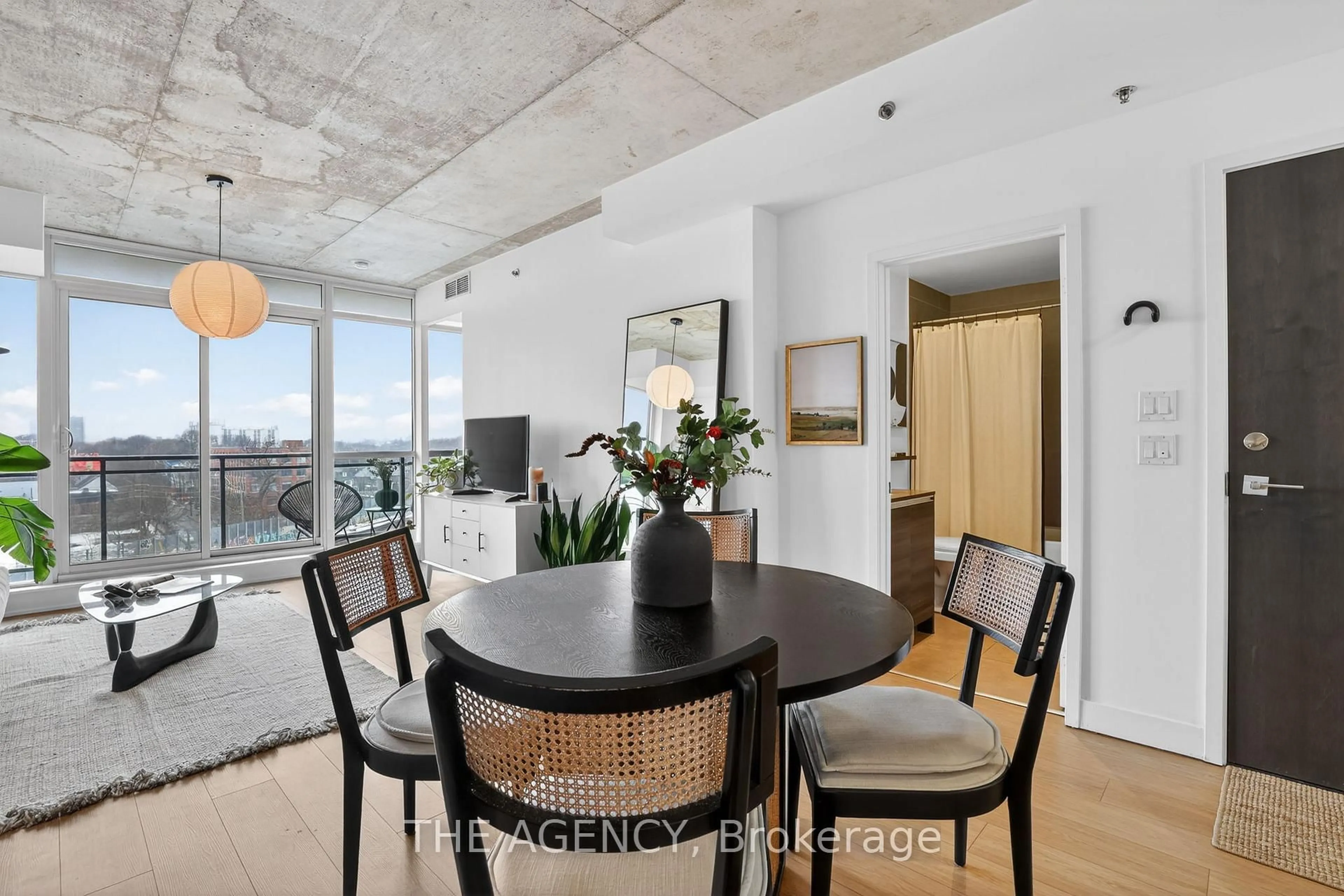 Dining room, cement floor for 20 Minowan Miikan Lane #710, Toronto Ontario M6J 0E5