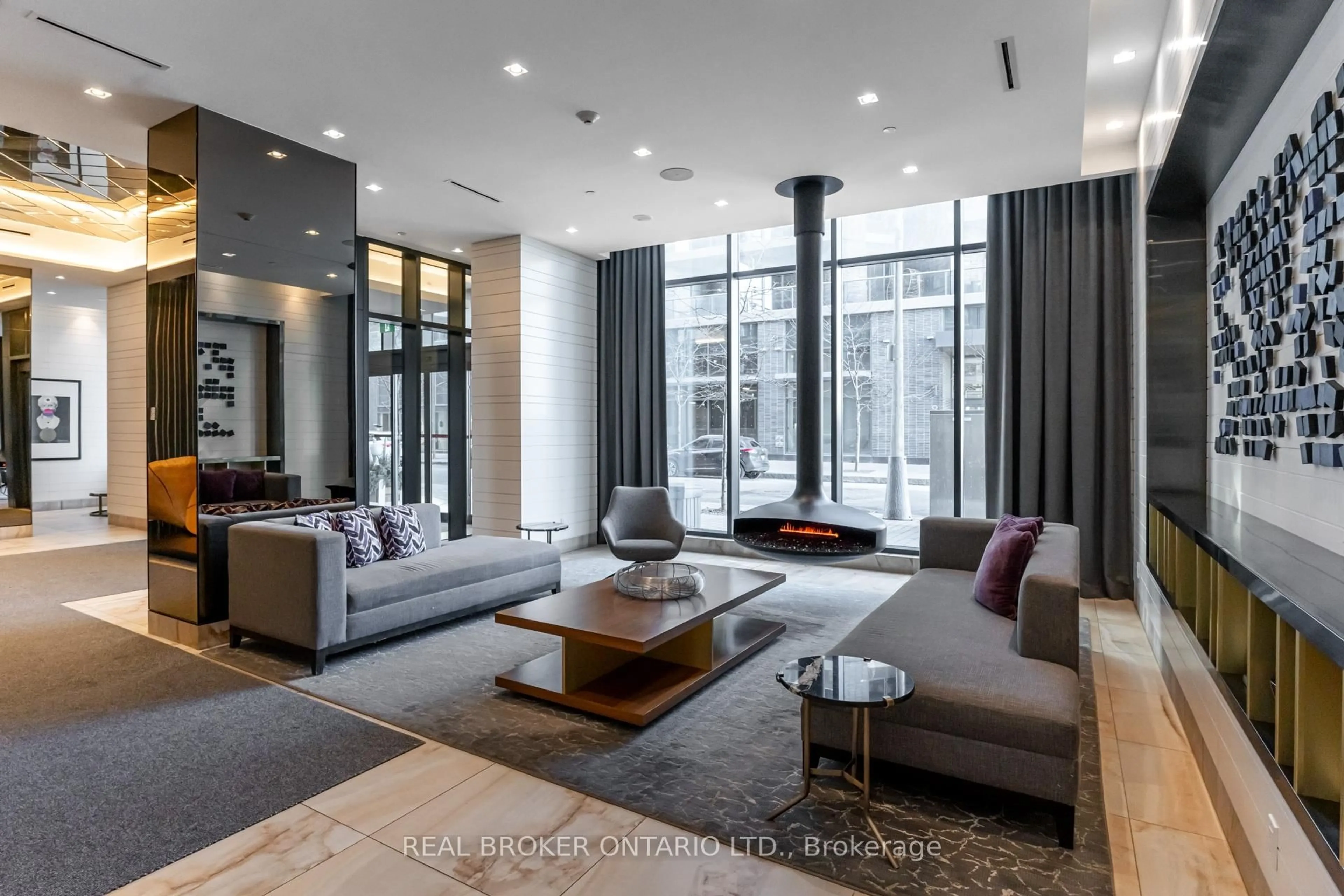 Living room with furniture, cement floor for 55 Merchants Wharf #620, Toronto Ontario M5A 0P2