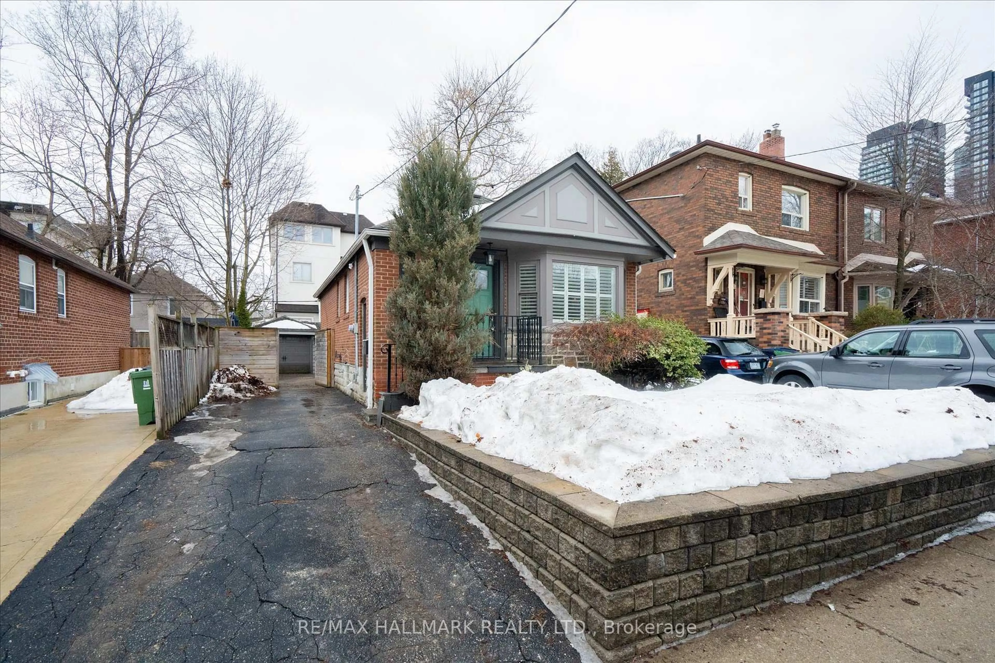 Home with brick exterior material, street for 49 Elvina Gdns, Toronto Ontario M4P 1X7