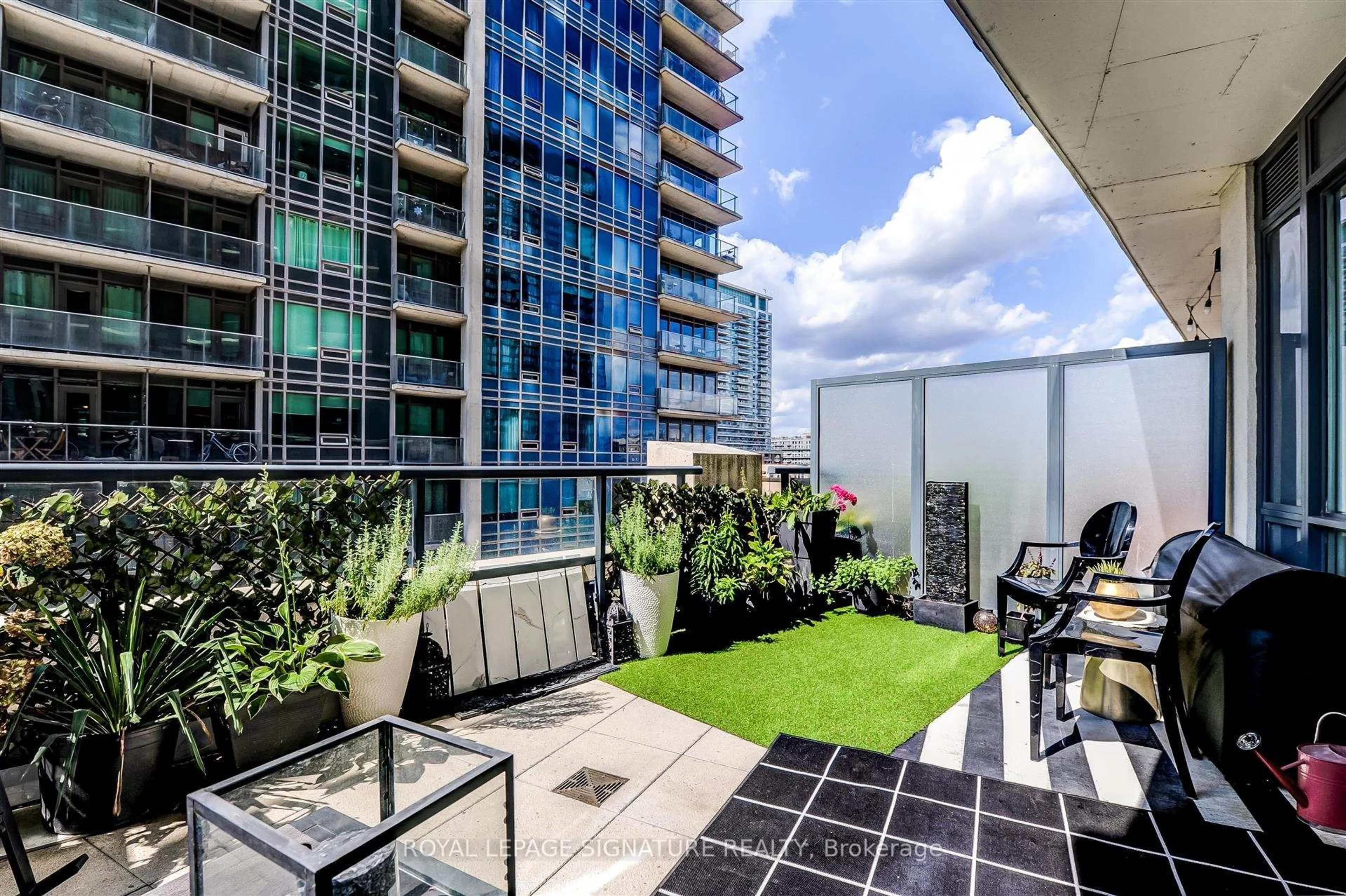 Patio, city buildings view from balcony for 51 East Liberty St #517, Toronto Ontario M6K 3P8