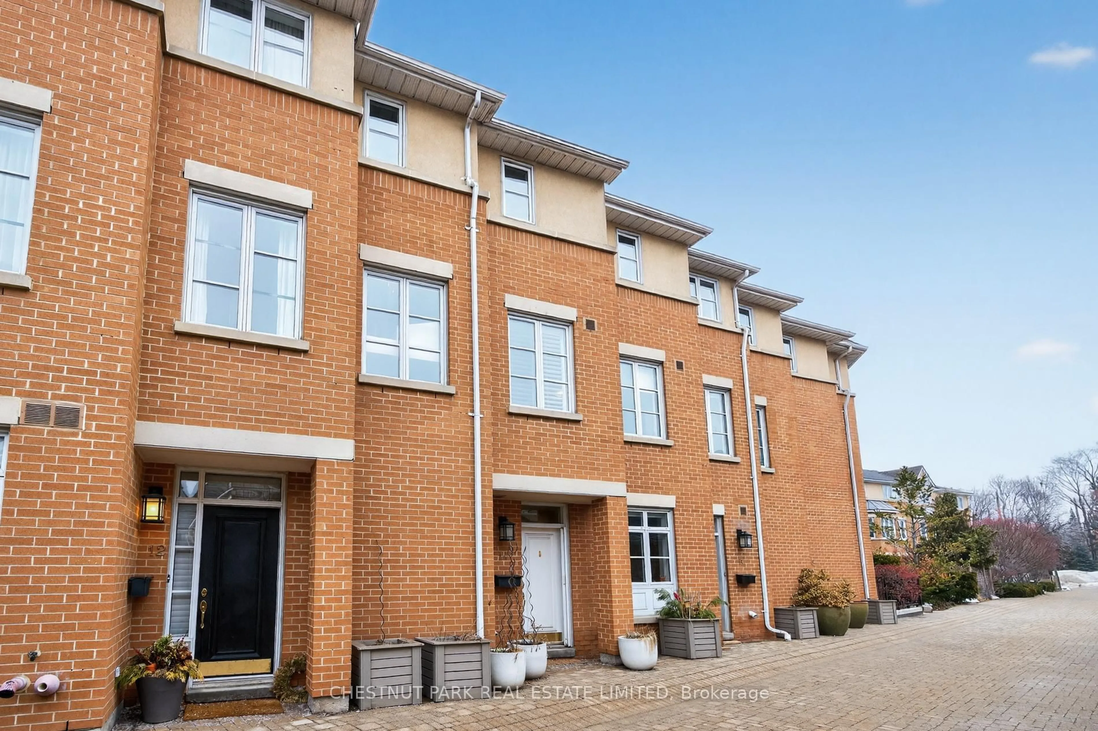 Home with brick exterior material, street for 14 Charlesworth Lane, Toronto Ontario M4T 3B5