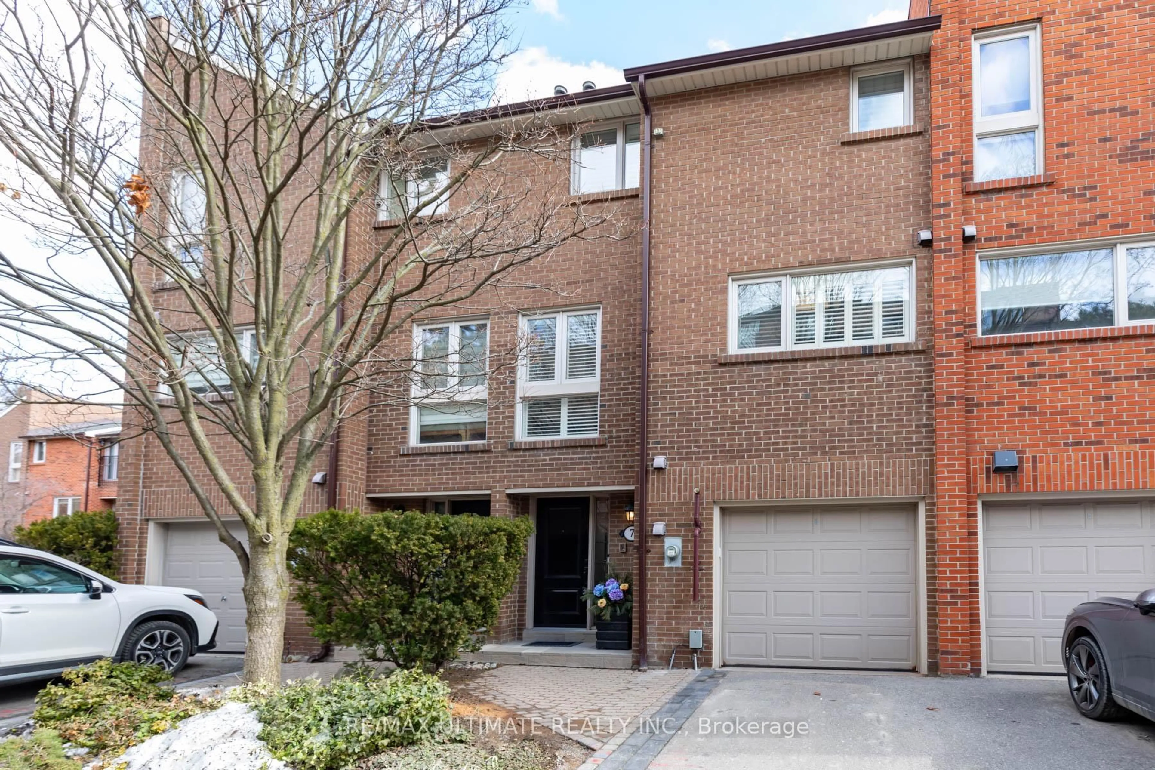 Home with brick exterior material, street for 7 Sylvan Valleyway, Toronto Ontario M5M 4M4
